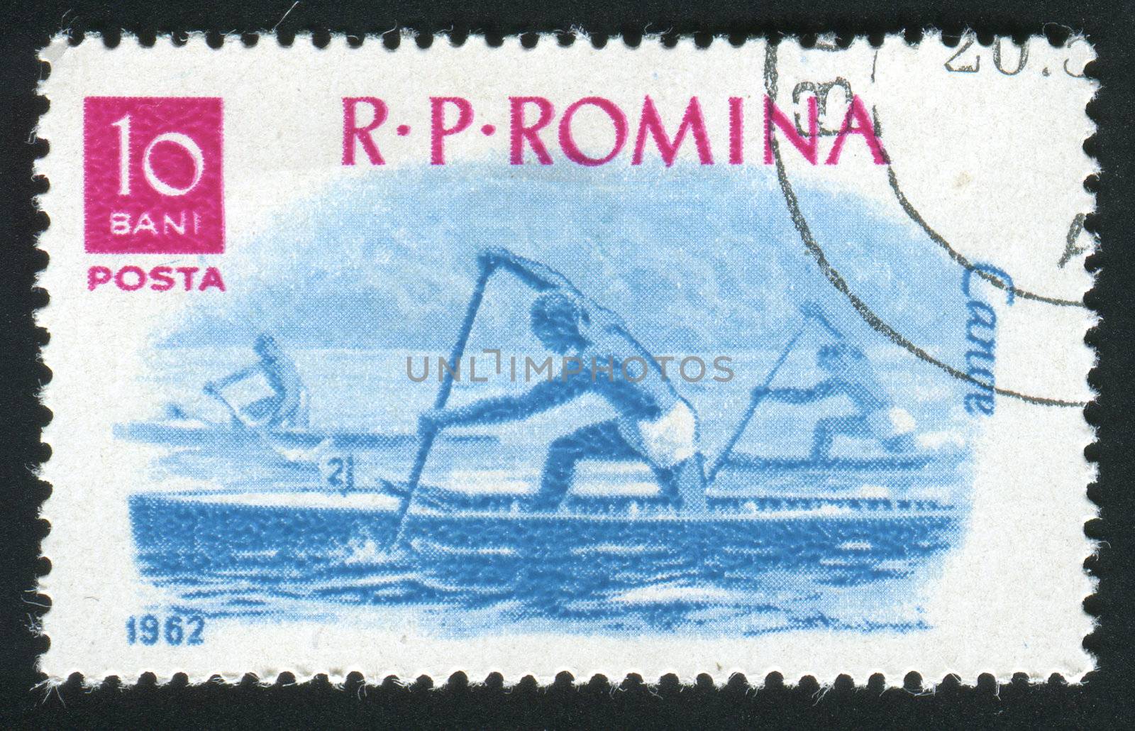 ROMANIA -CIRCA 1962: Sports racing on rowing on a canoe, circa 1962.