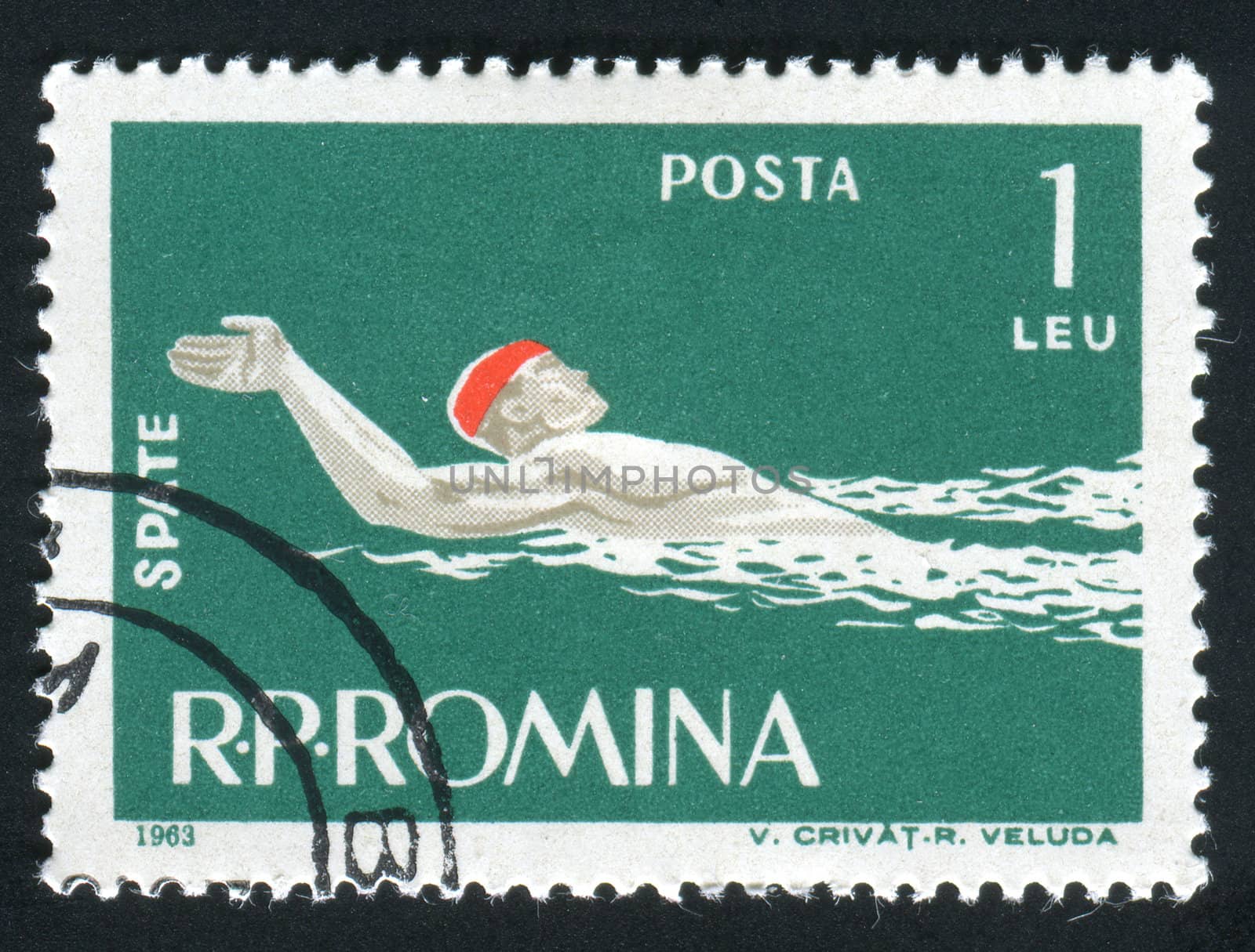 ROMANIA -CIRCA 1963: Sports competitions on a backstroke, circa 1963.