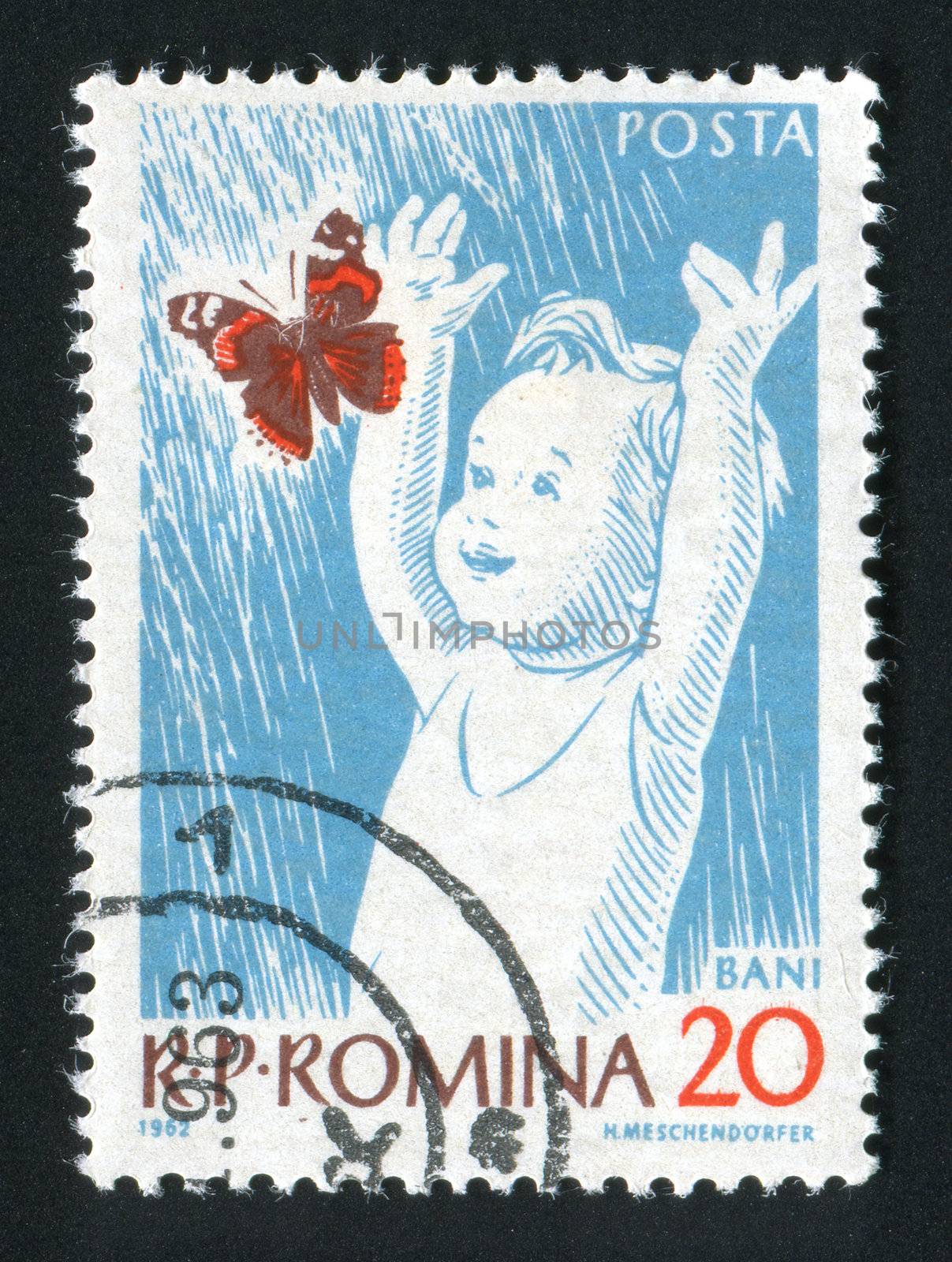 ROMANIA - CIRCA 1962: The kid plays with the butterfly, circa 1962.