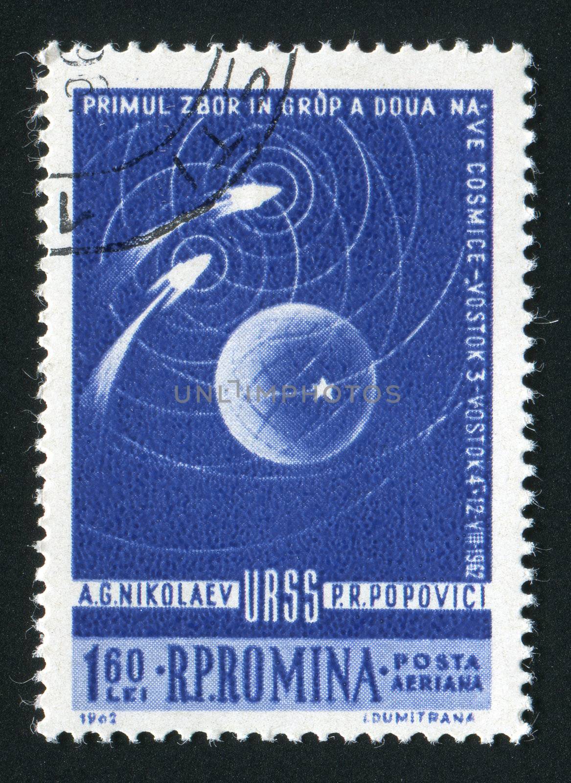 ROMANIA - CIRCA 1962: Space rockets fly round the Earth, circa 1962.