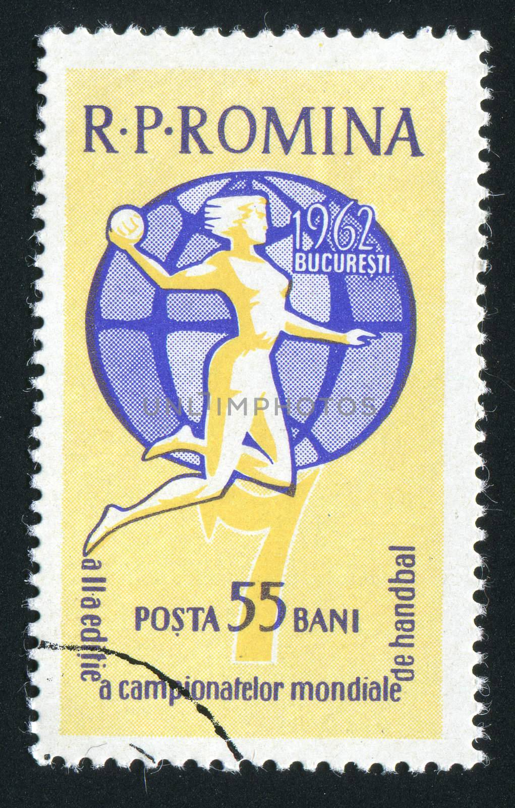 ROMANIA - CIRCA 1955: The girl runs with a ball against the globe, circa 1955.