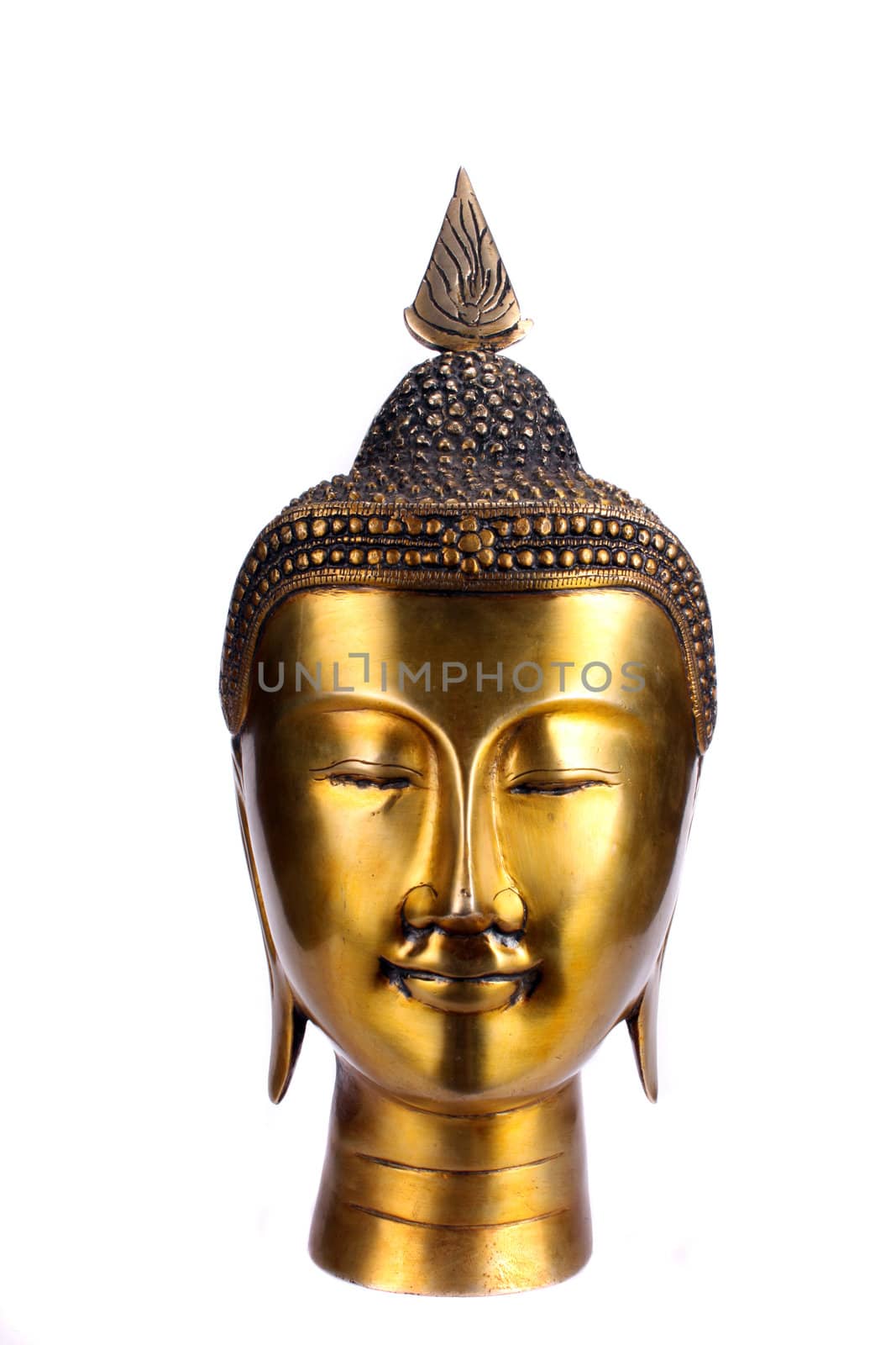 An antique metal sculpture of meditating Buddha, isolated on white studio background.