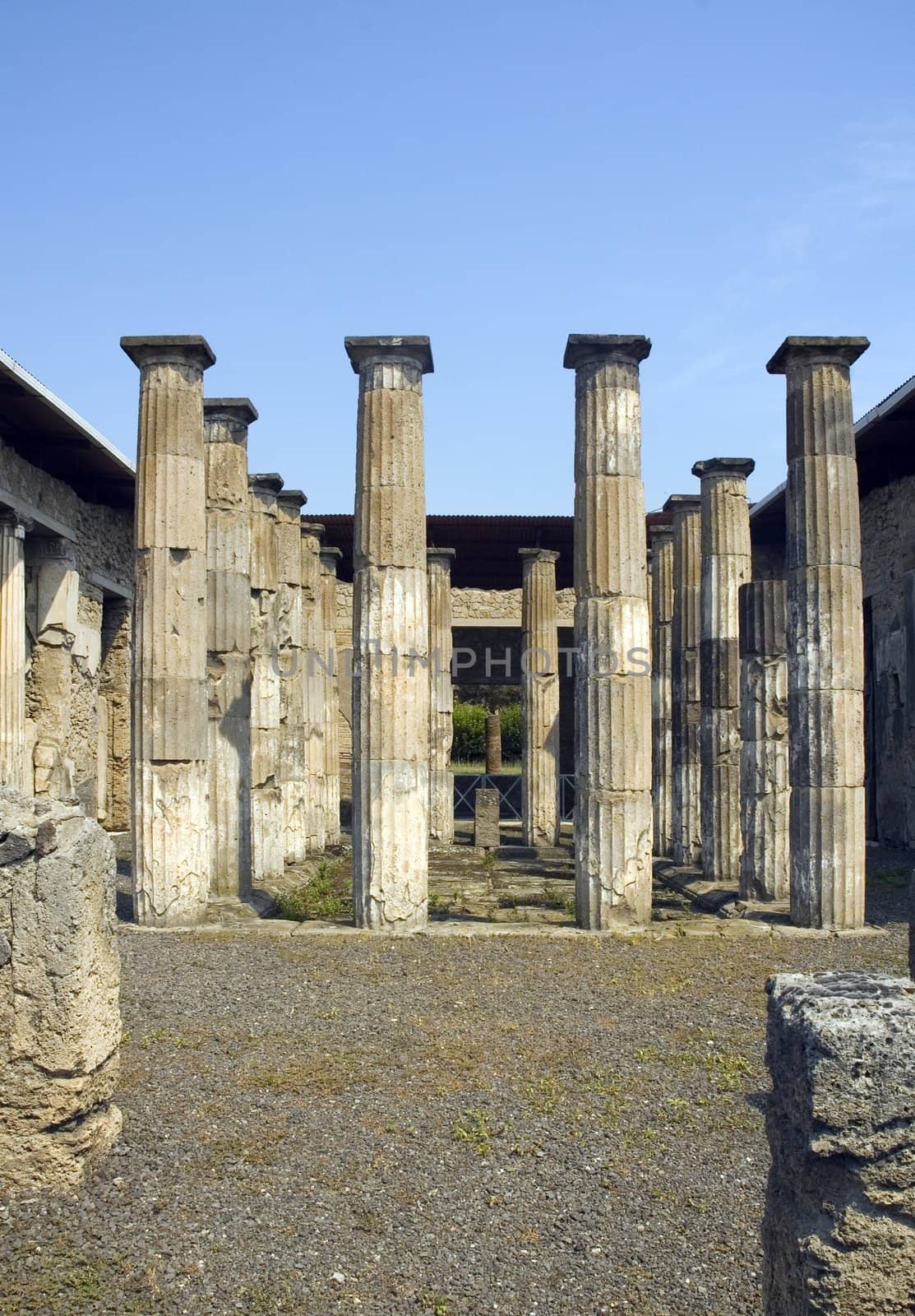 Roman ruins in Pompeii with columns that supported a temple