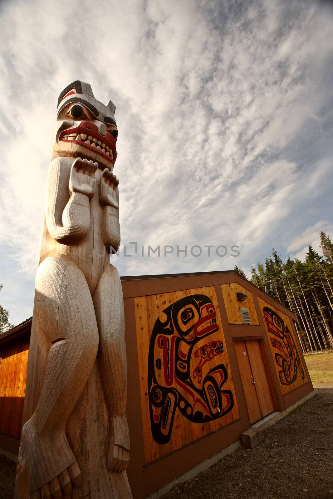 Totem pole outside native lodge at Kitsumkalum Provincial Park