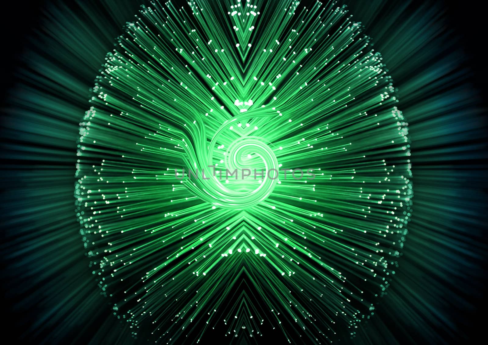 Close up on the ends of many illuminated green fiber optic strands with light strand swirl in the centre. Black and aqua blur background.