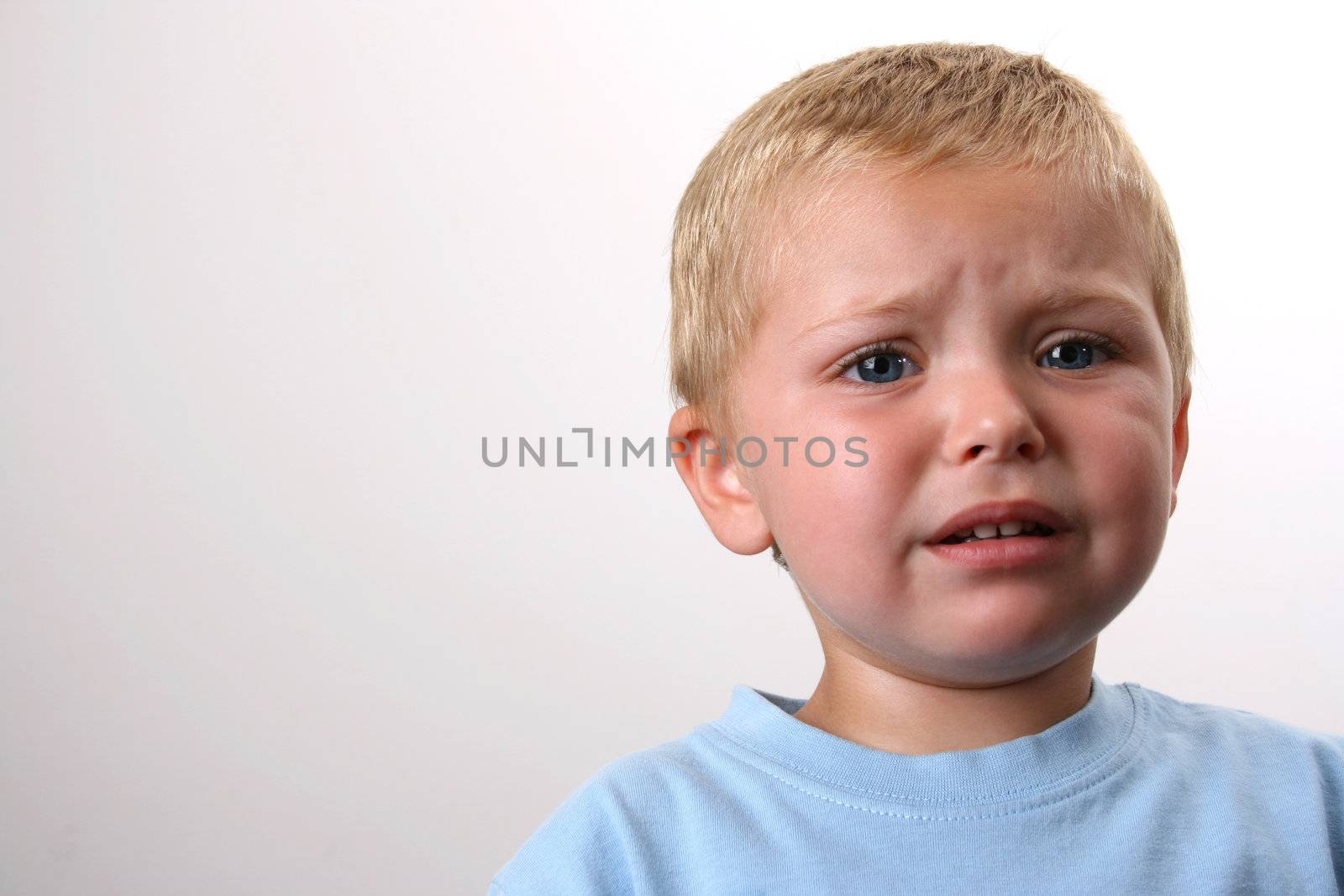 Beuatiful Blond toddler with big blue eyes