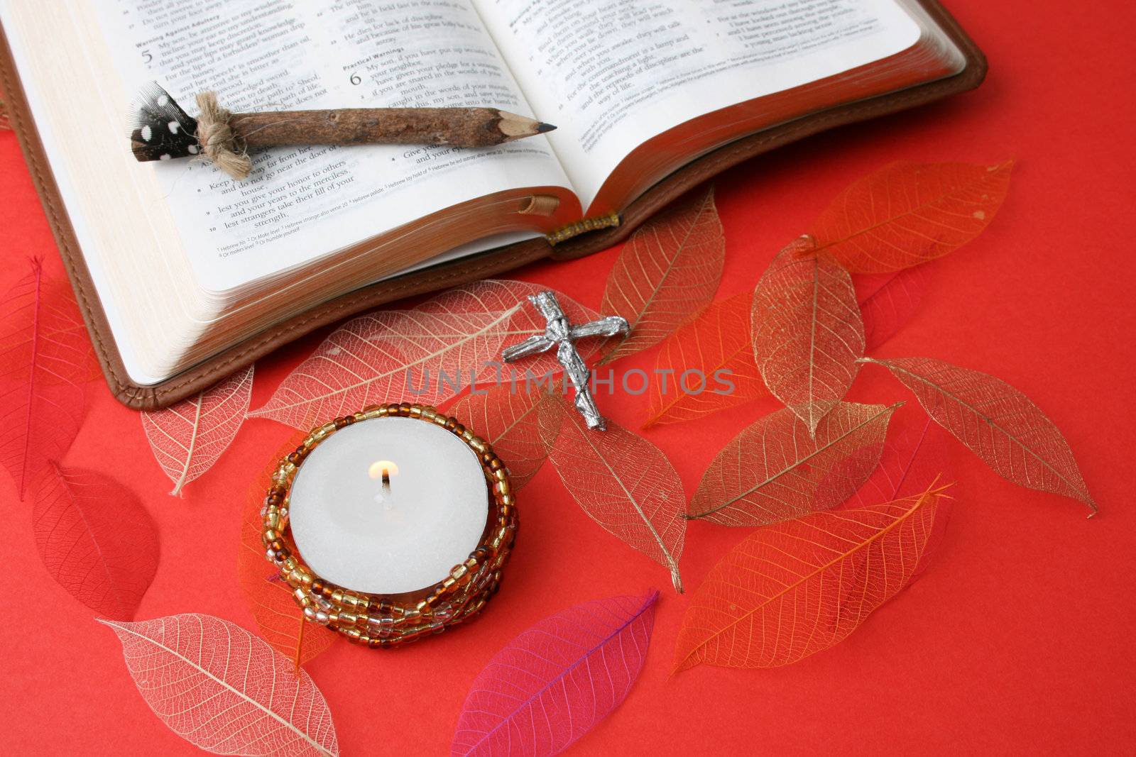 Leather bound bible opened at a piece of scripture