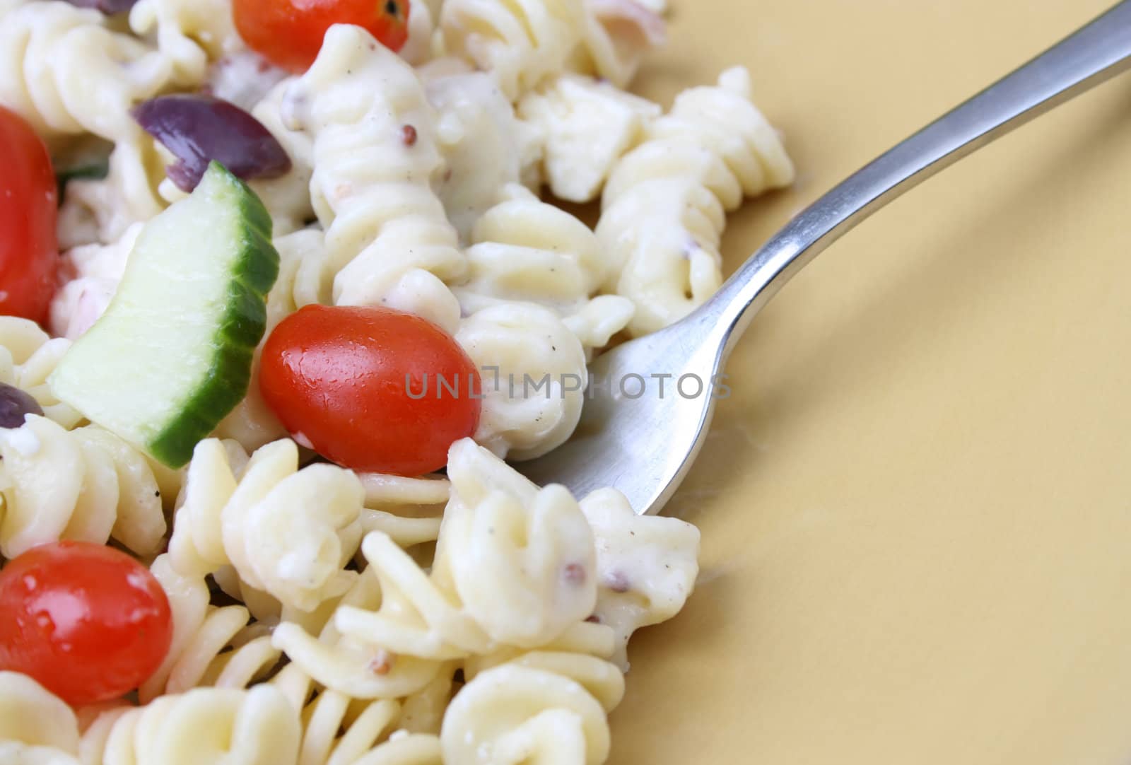 Cold Pasta Salad with tomatoes, cucumbers and olives