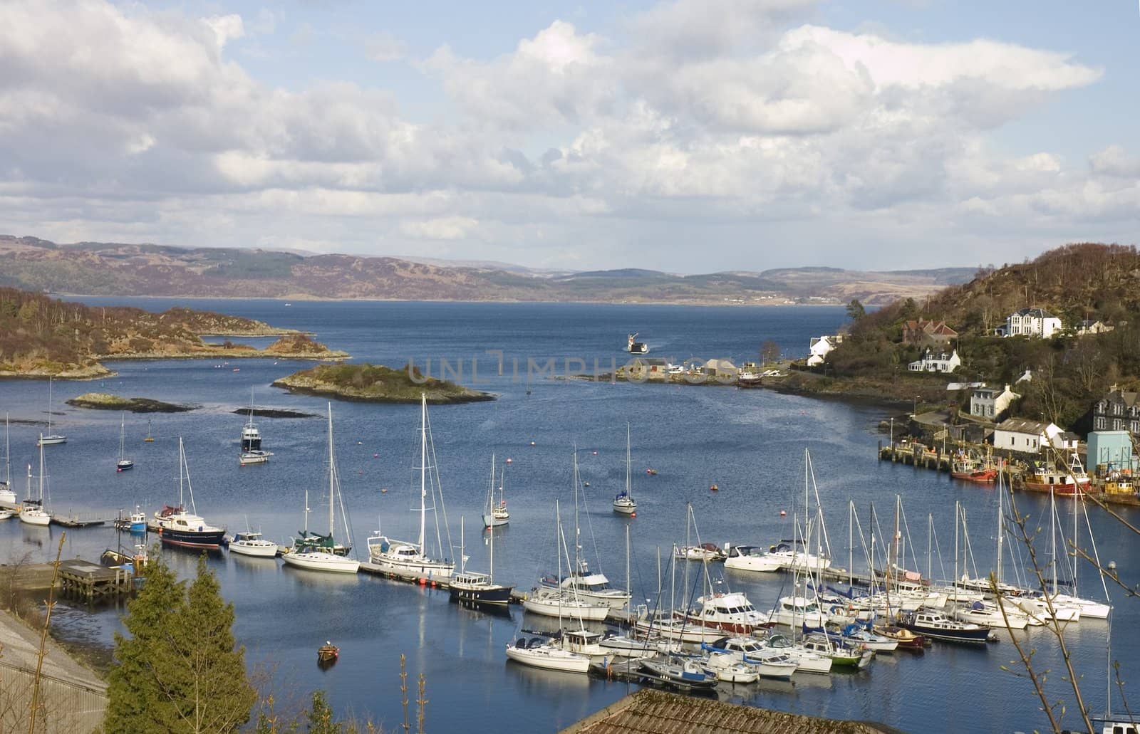 Tarbert, Scotland, harbor, with the Kintyre to Bute ferry arriving in the terminal 