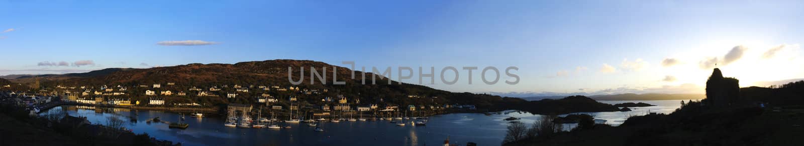 Panorama of Loch Fyne, Bruce's castle and Tarbert Harbor in Scotland at sunrise