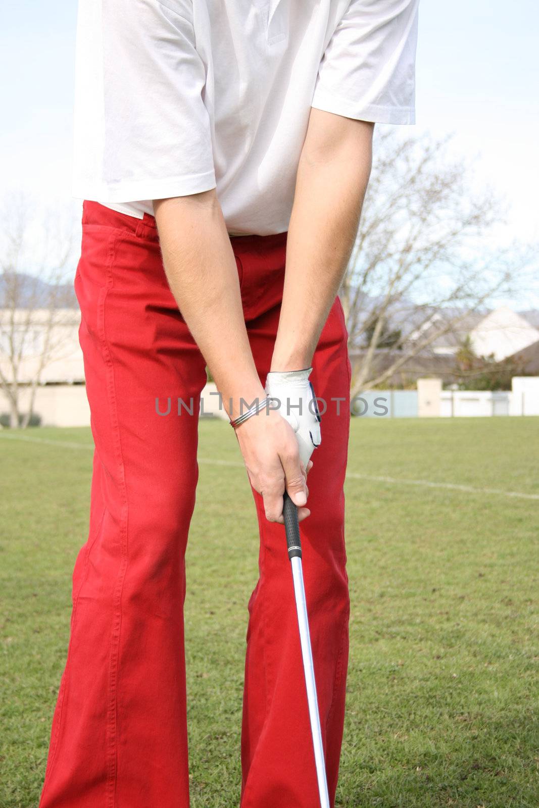 Golf Grip of golfer on range during practise