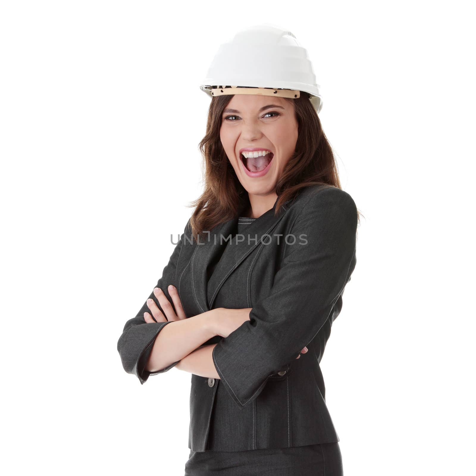 Portrait of confident female worker in white helmet