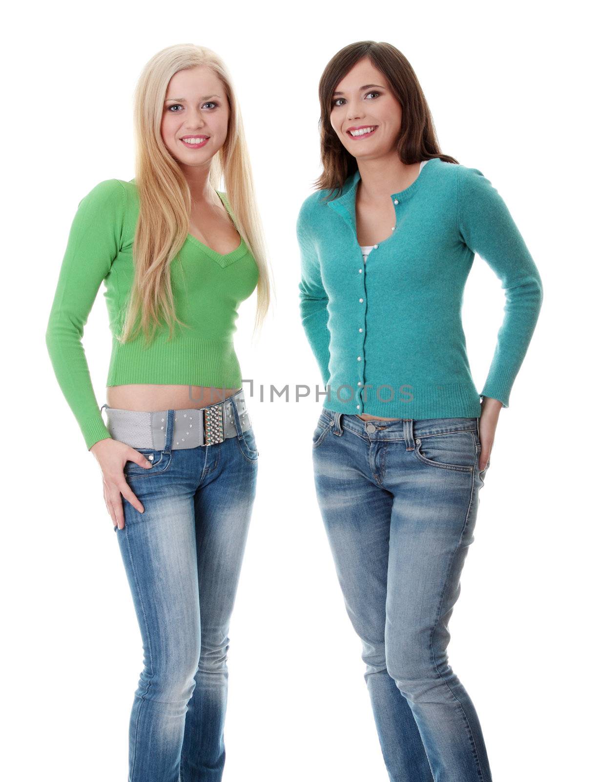 Two happy girls isolated on white