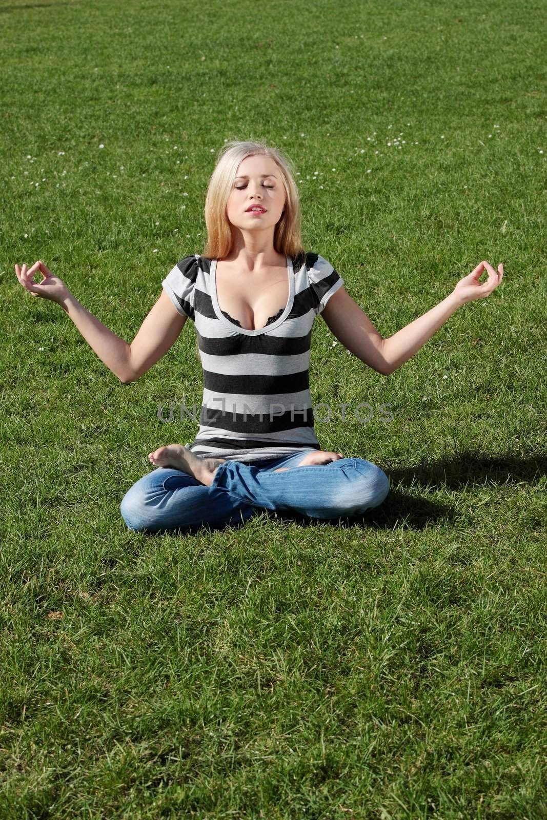 A girl meditating by BDS