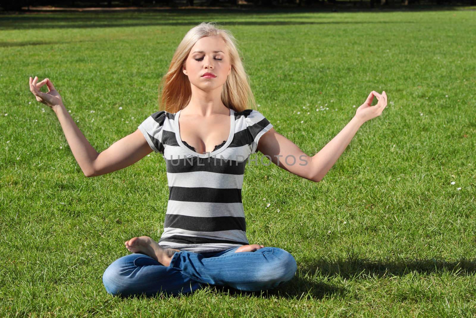 A girl meditating by BDS