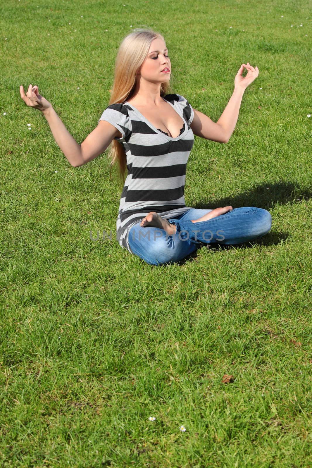 A girl meditating by BDS