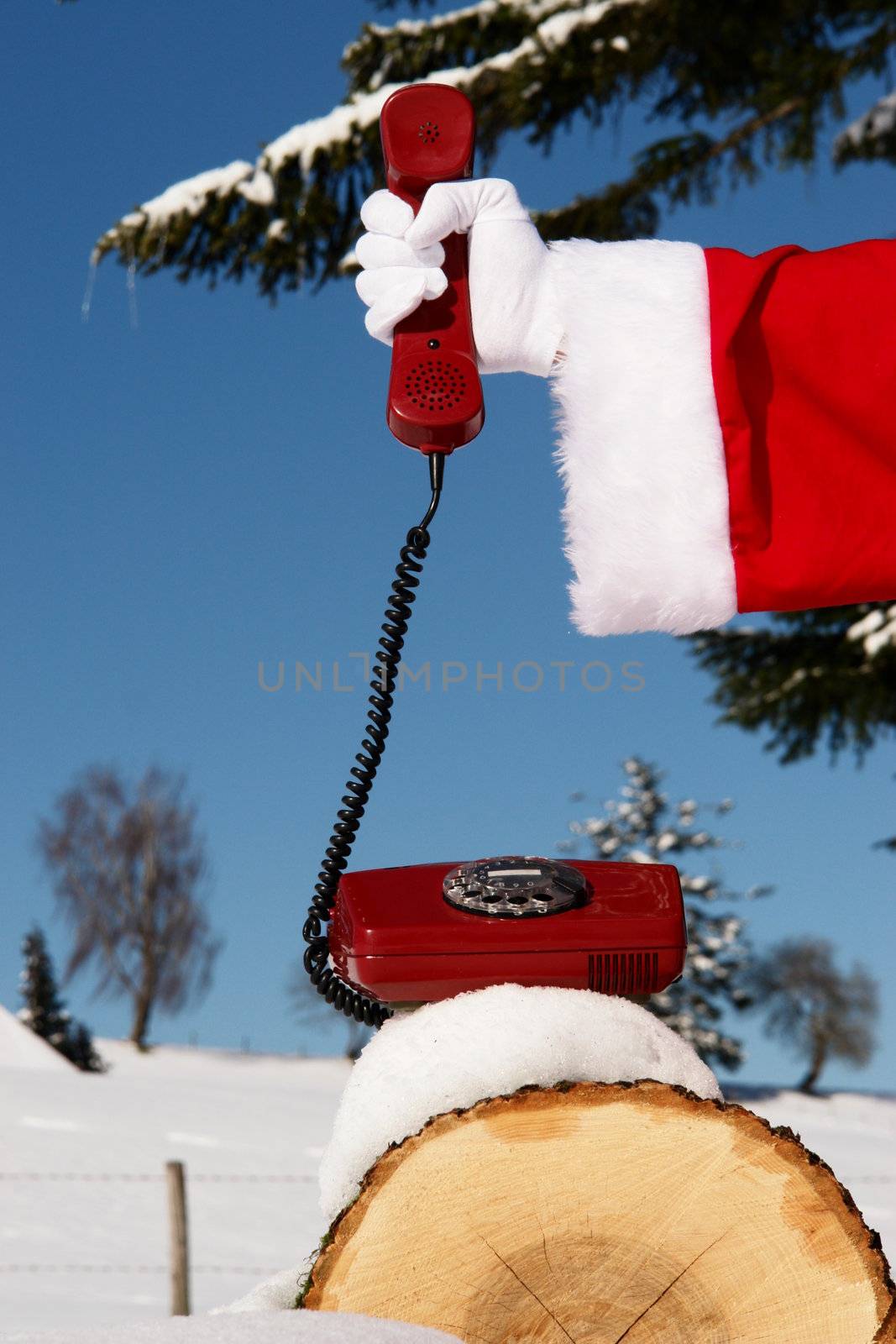 Santa Claus Hotline symbolized by a red retro phone