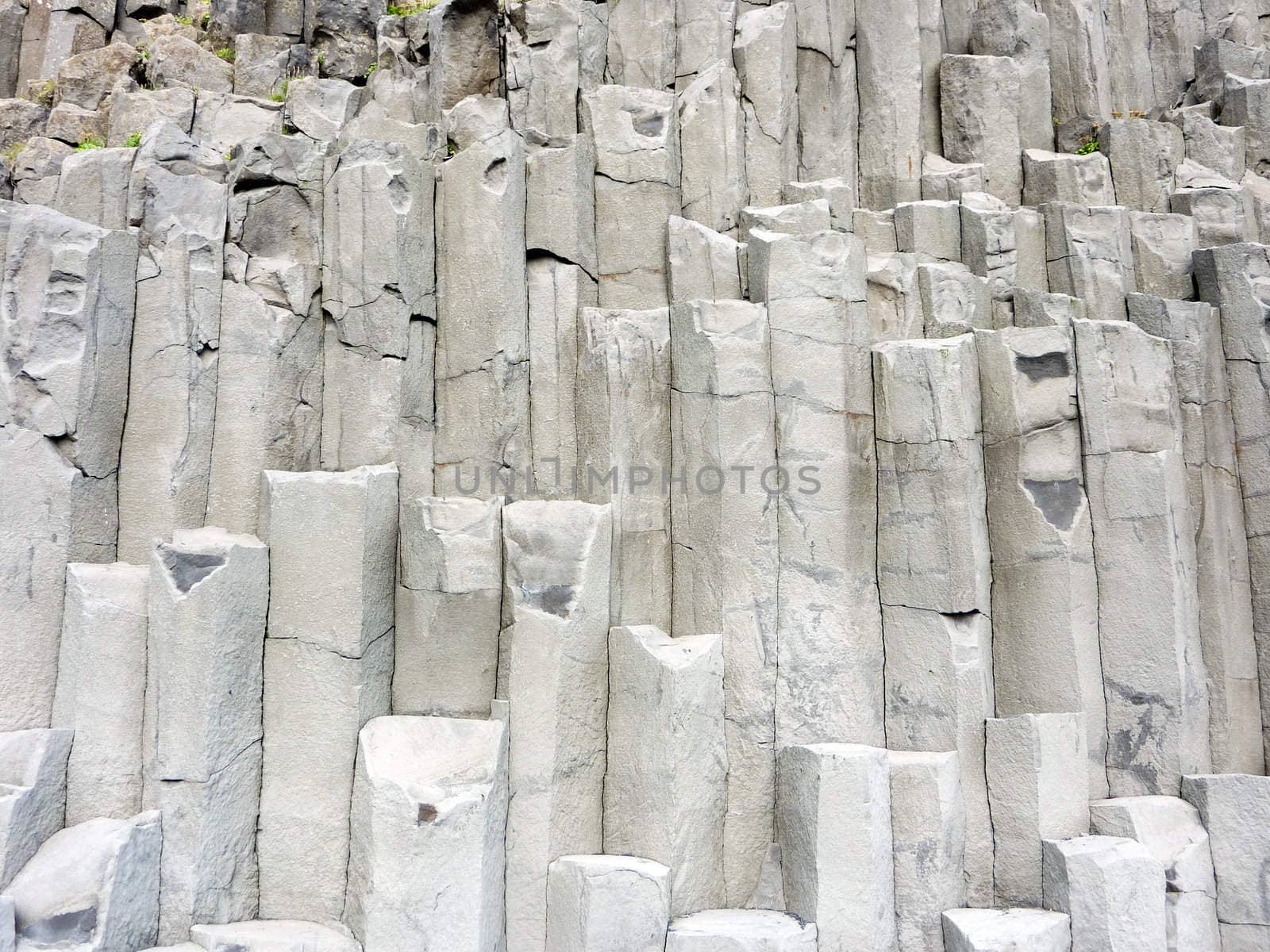 Gray basalt column formation rocks in Iceland