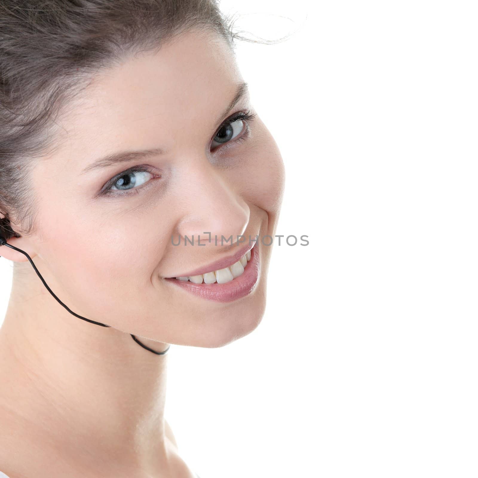 Young fitness woman with sport headphones listening music isolated