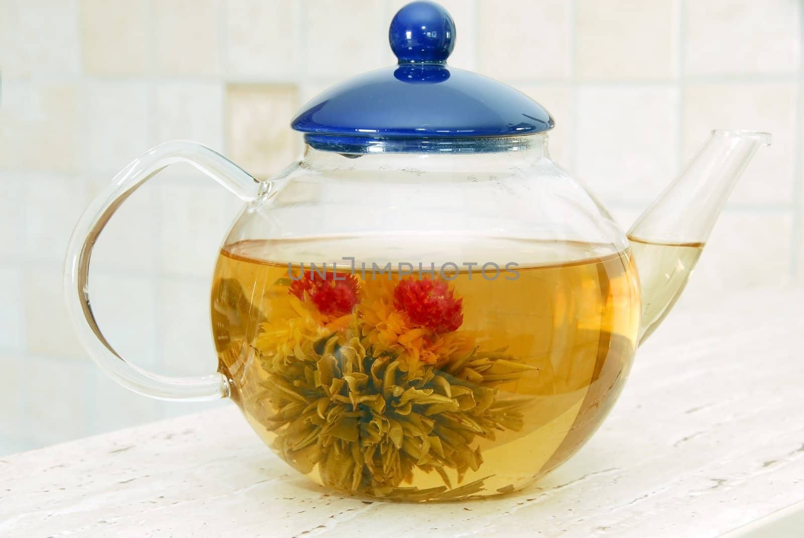 aromatic green tea flower in glass pot