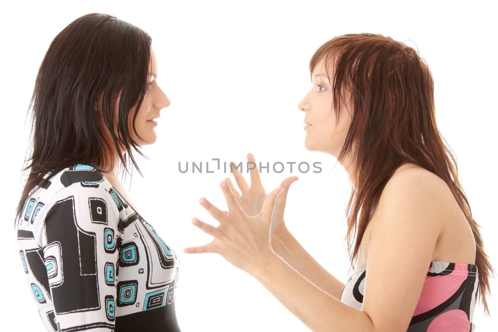 Two young womans arguing, isolated on white background