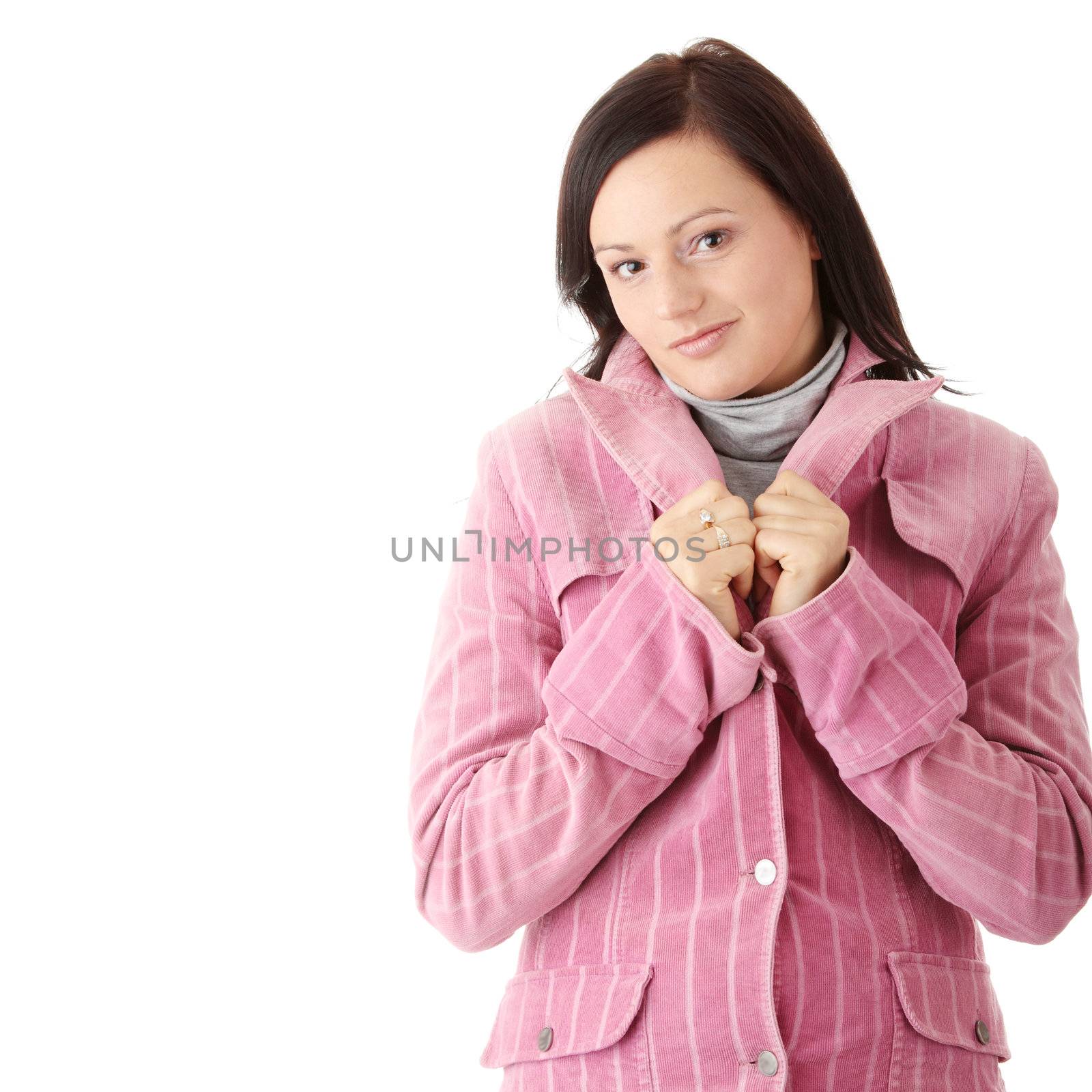 Woman in pink winter coat isolated