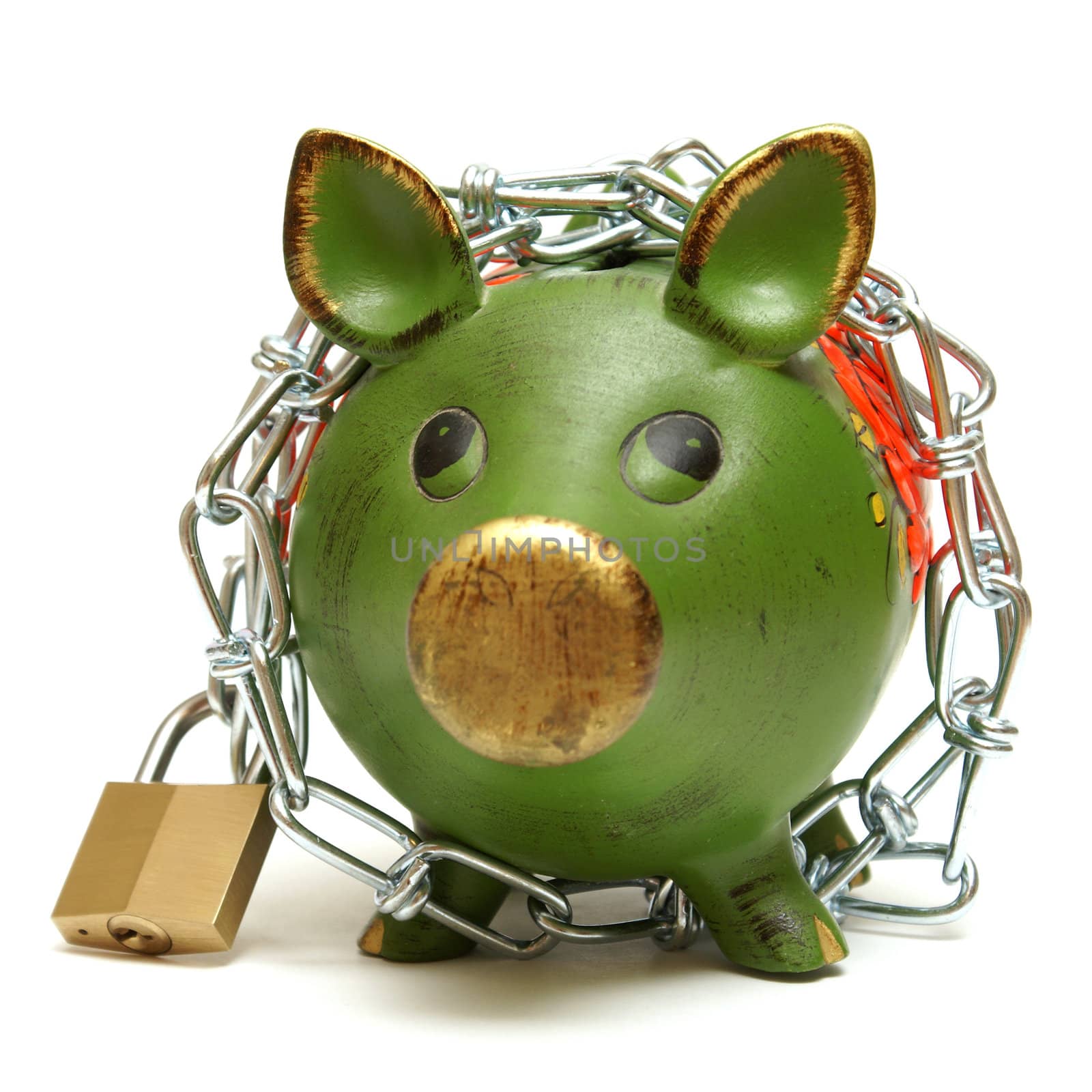 A conceptual shot of an isolated piggy bank that is bound by chains to give representation to protecting your money.