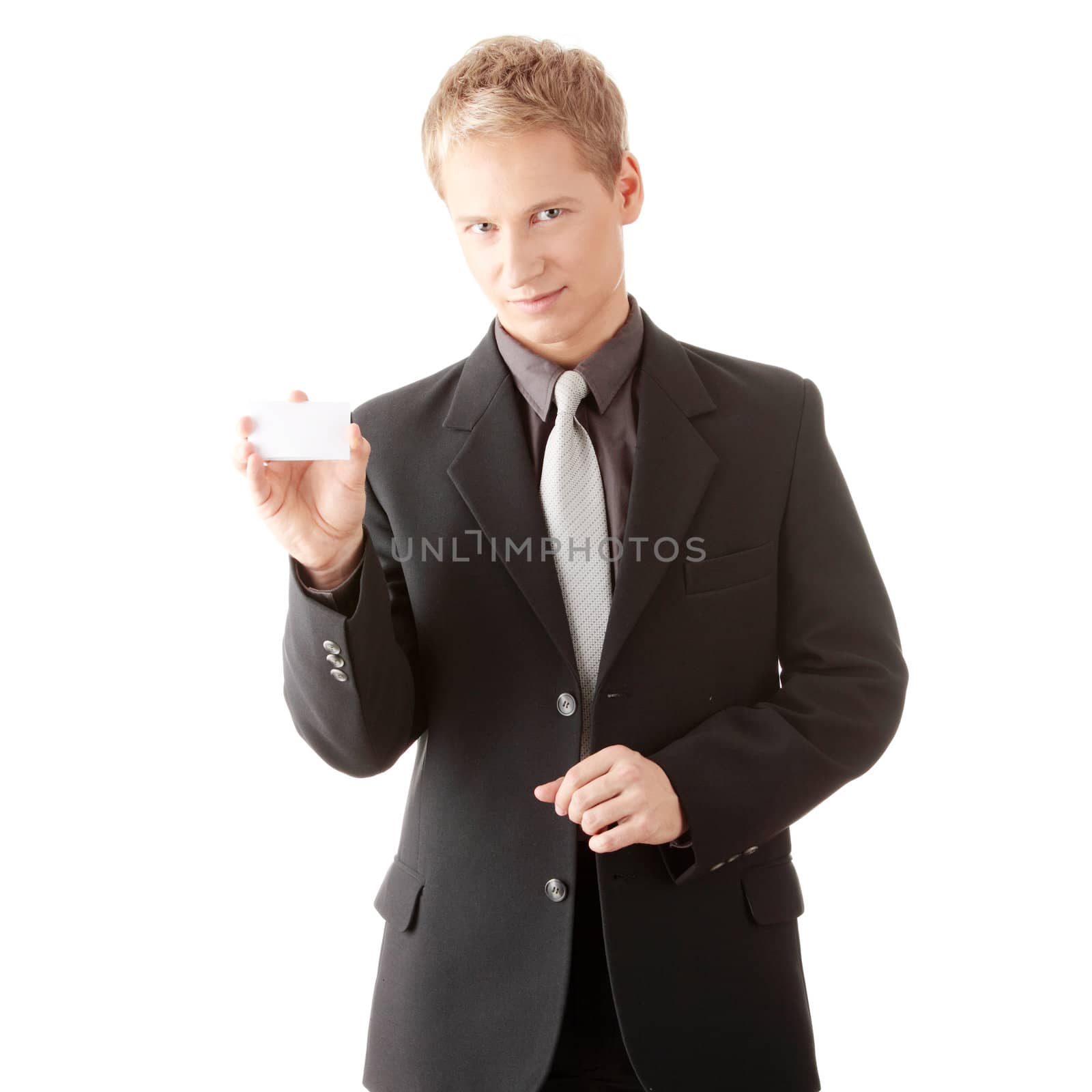 Businessman holding blank card isolated