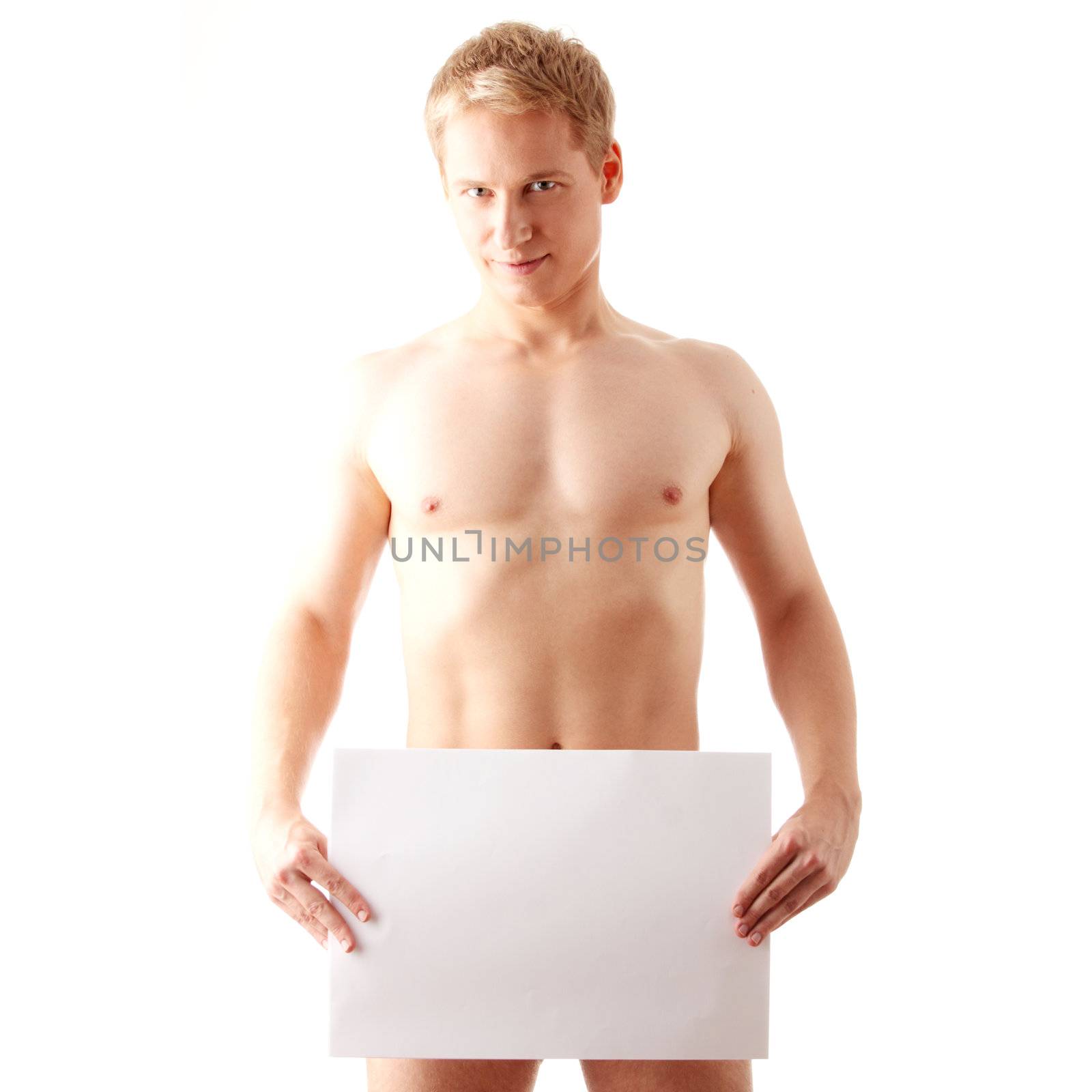 Young muscular nude man covering a copy space blank billboard isolated on white