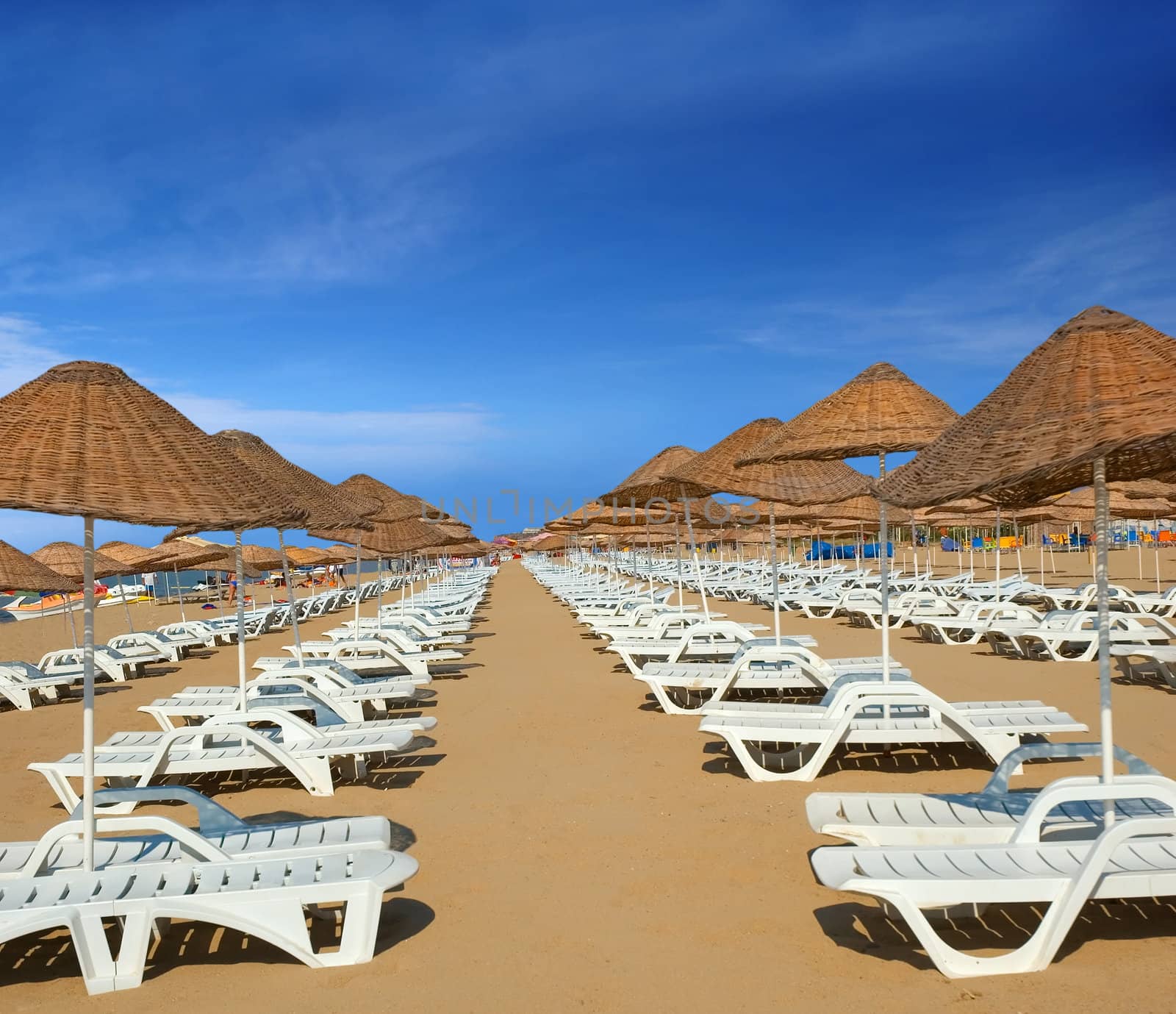 Beach chairs on a sandy beach in Turkey