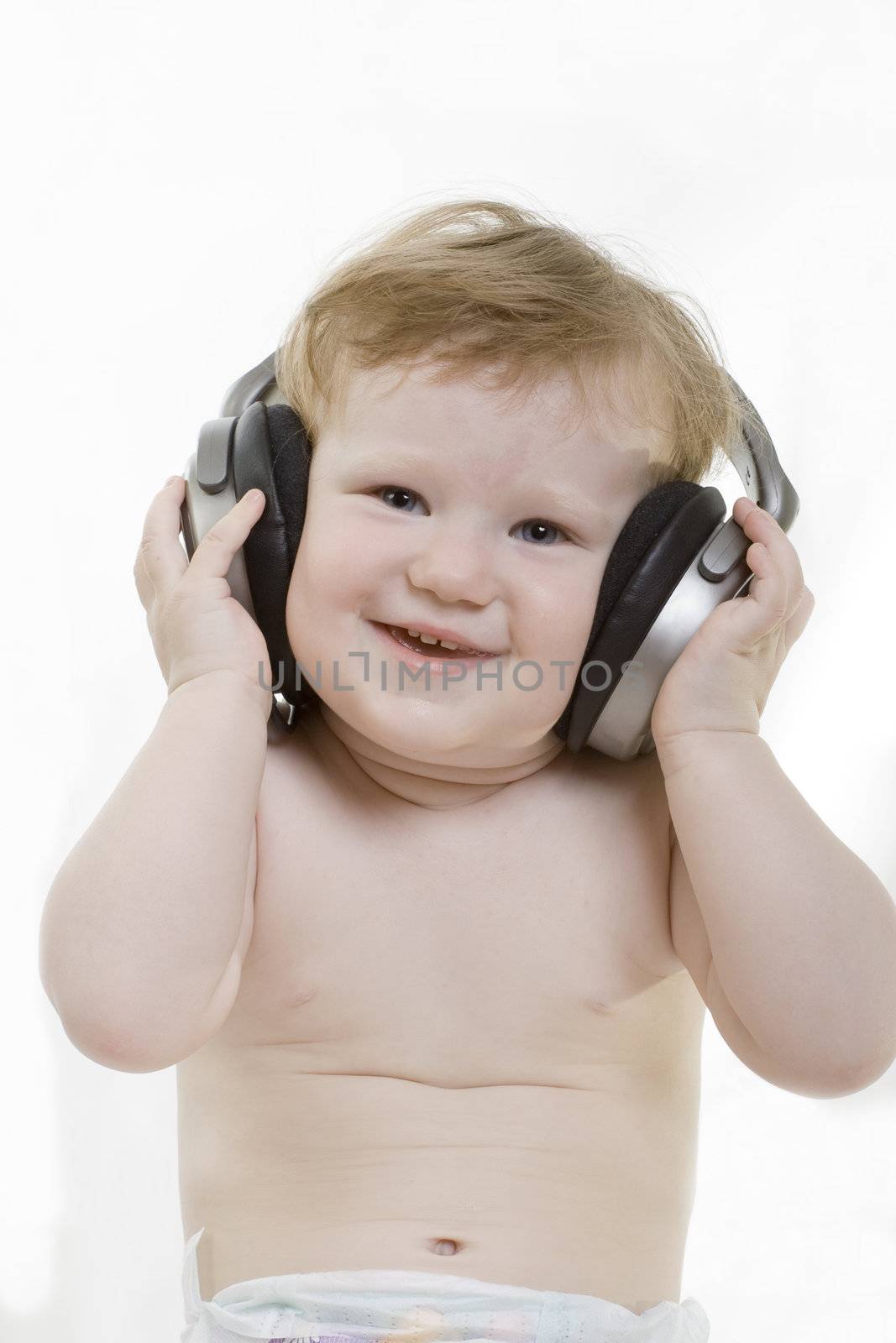 Smiling baby with headphones