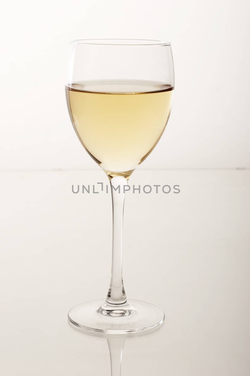 Isolated glass of white wine