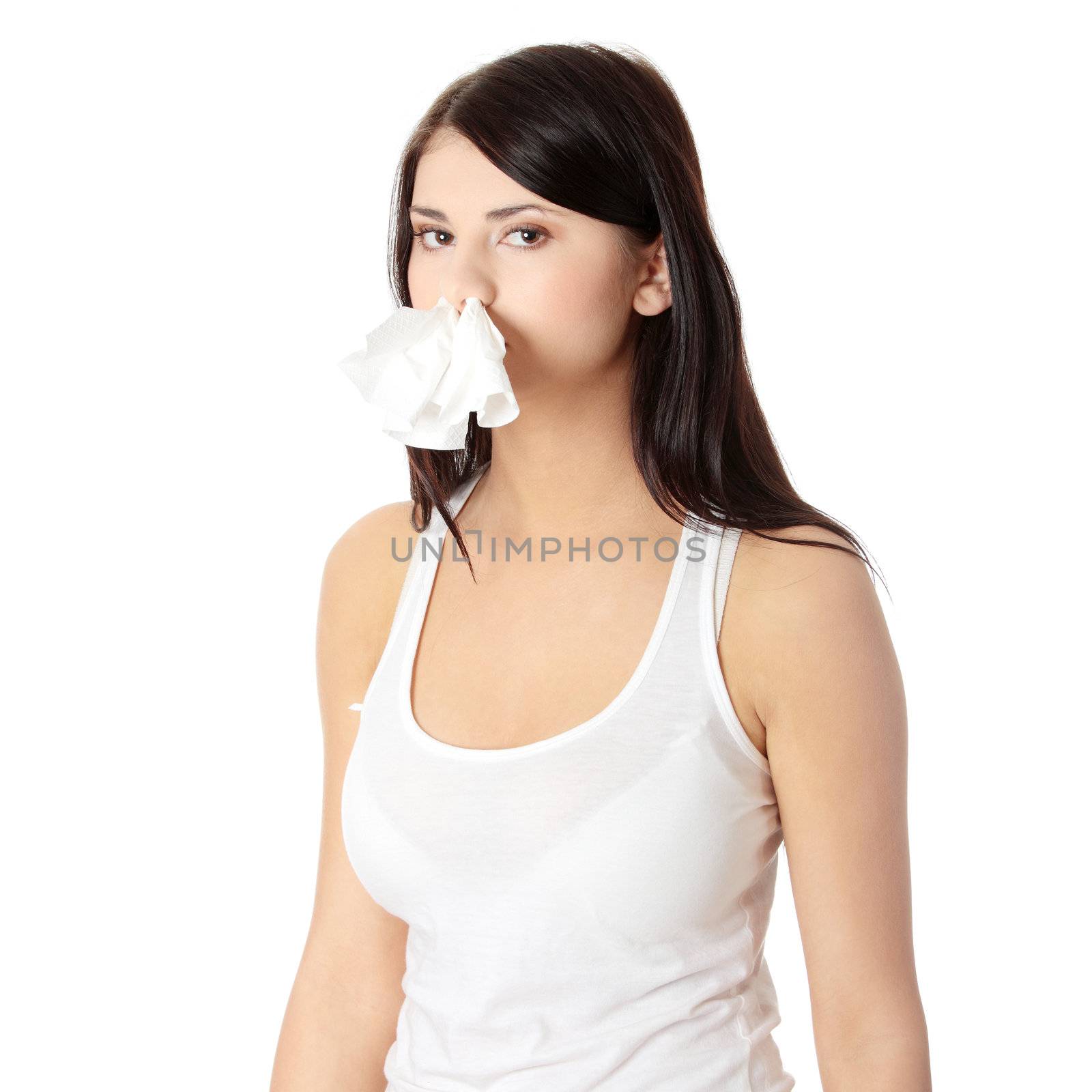 Young woman with allergy or cold, isolated on white background