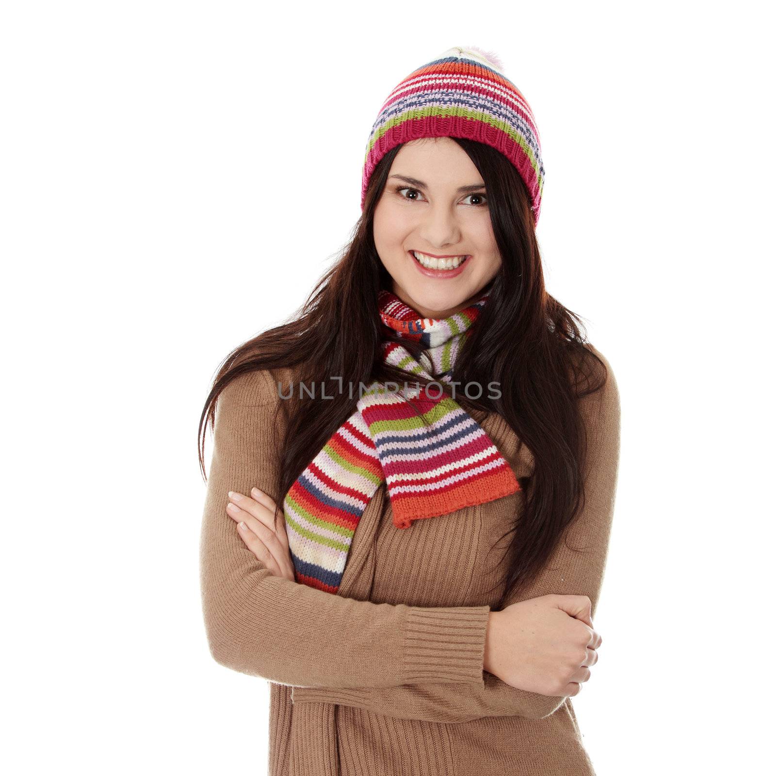 Close up of young woman with winter cap smiling at the camera isoalted on white background