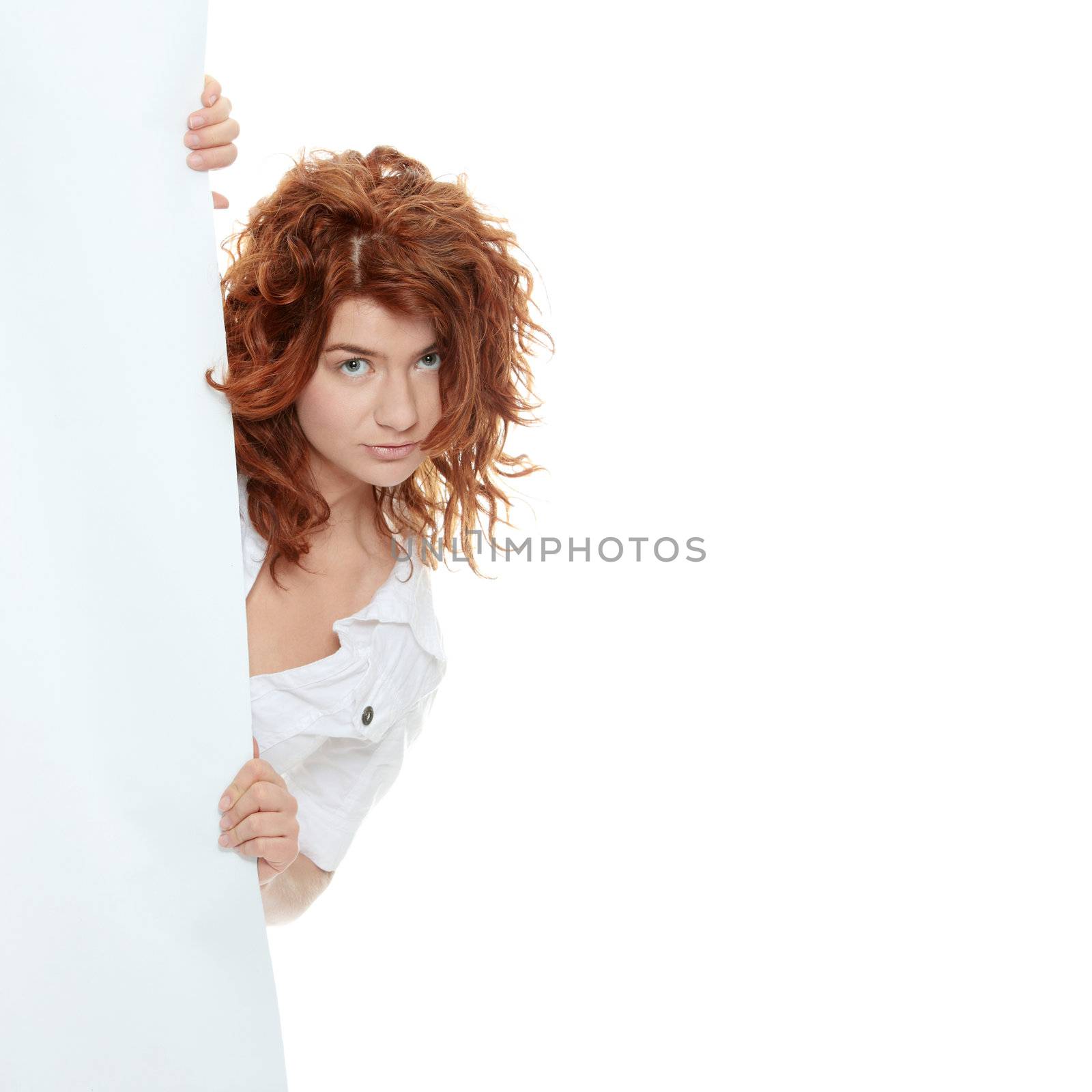 A pretty young woman holding a blank sign,isolated on white background