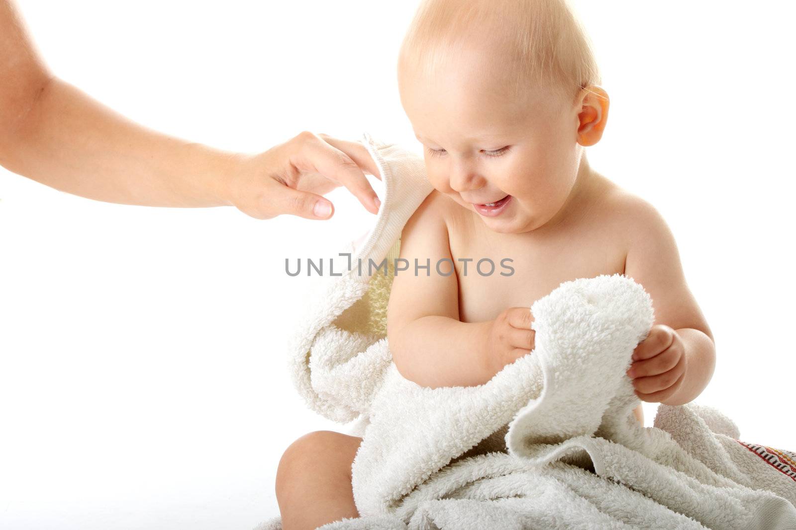Baby after bath. Cheerful child isolated
