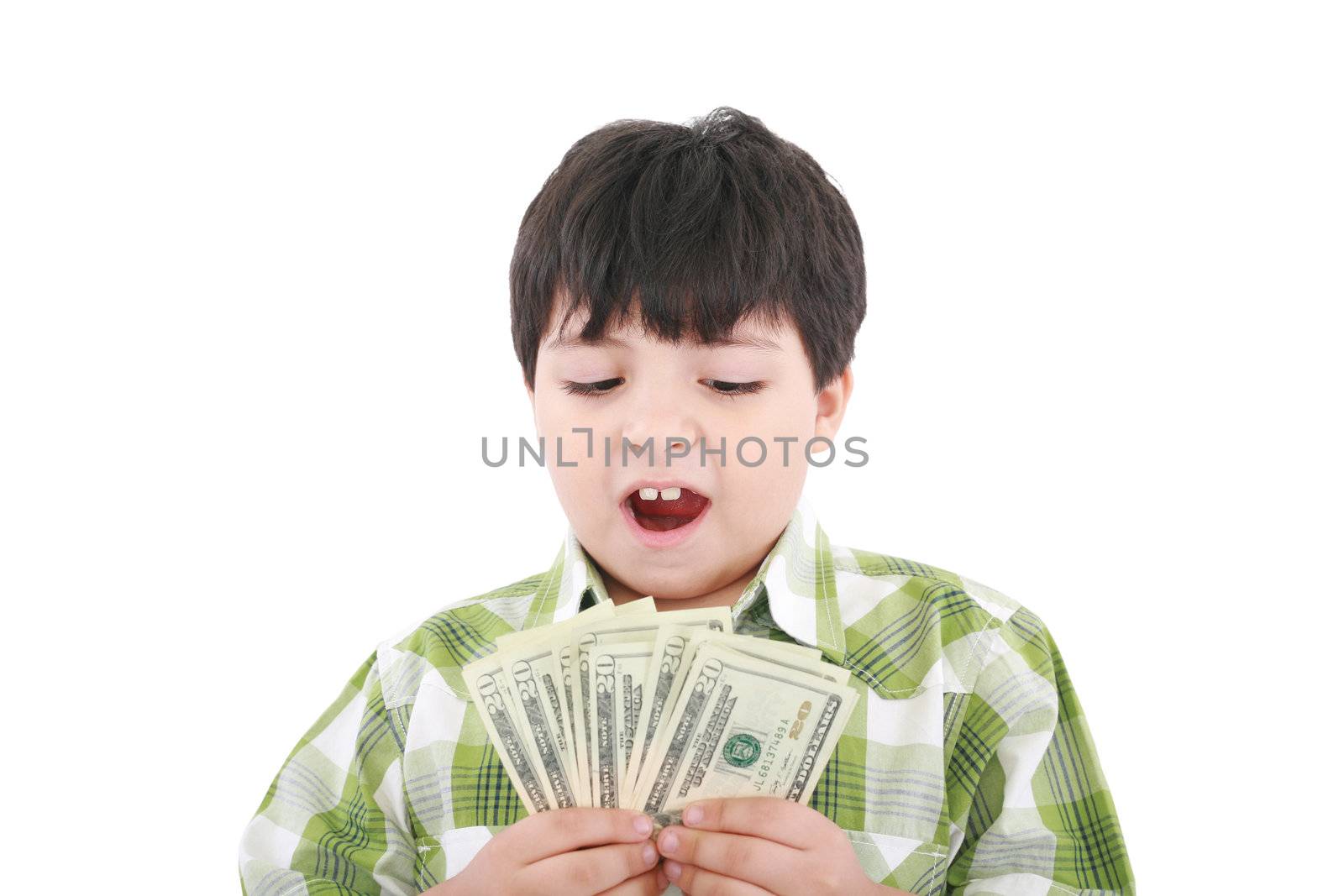 A smiling little boy is counting money - on white background by dacasdo
