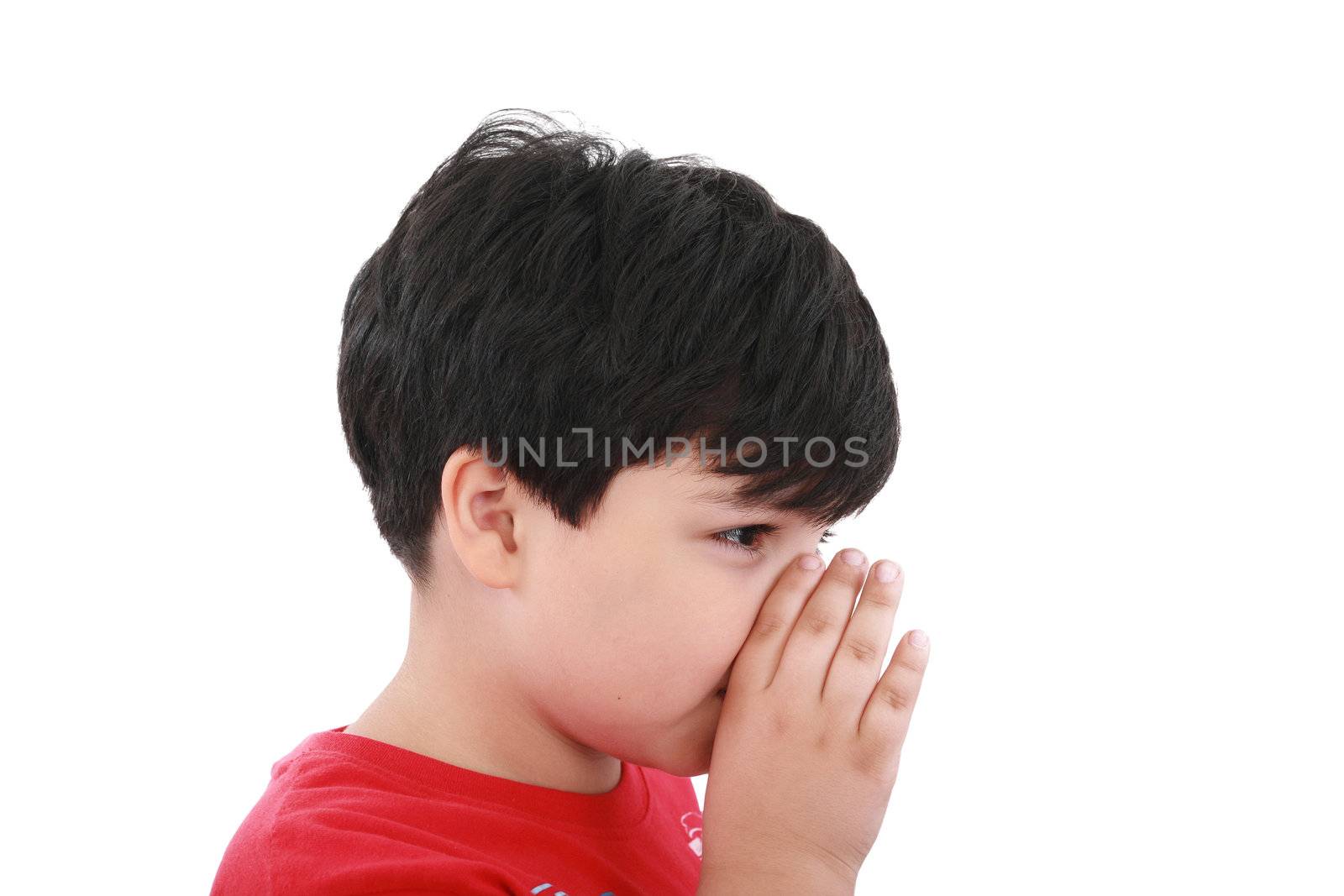 a boy is telling a secret with a hand symbol