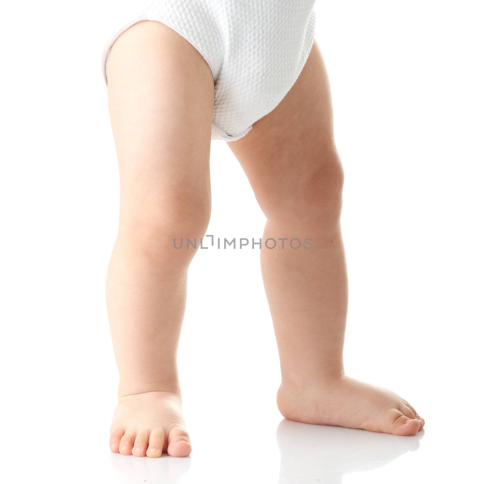 Baby legs isolated on white background