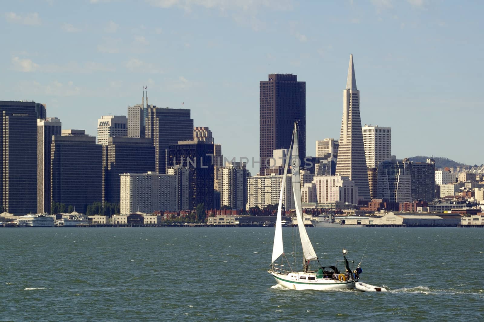 City of San Francisco with a yatch sailing across the bay