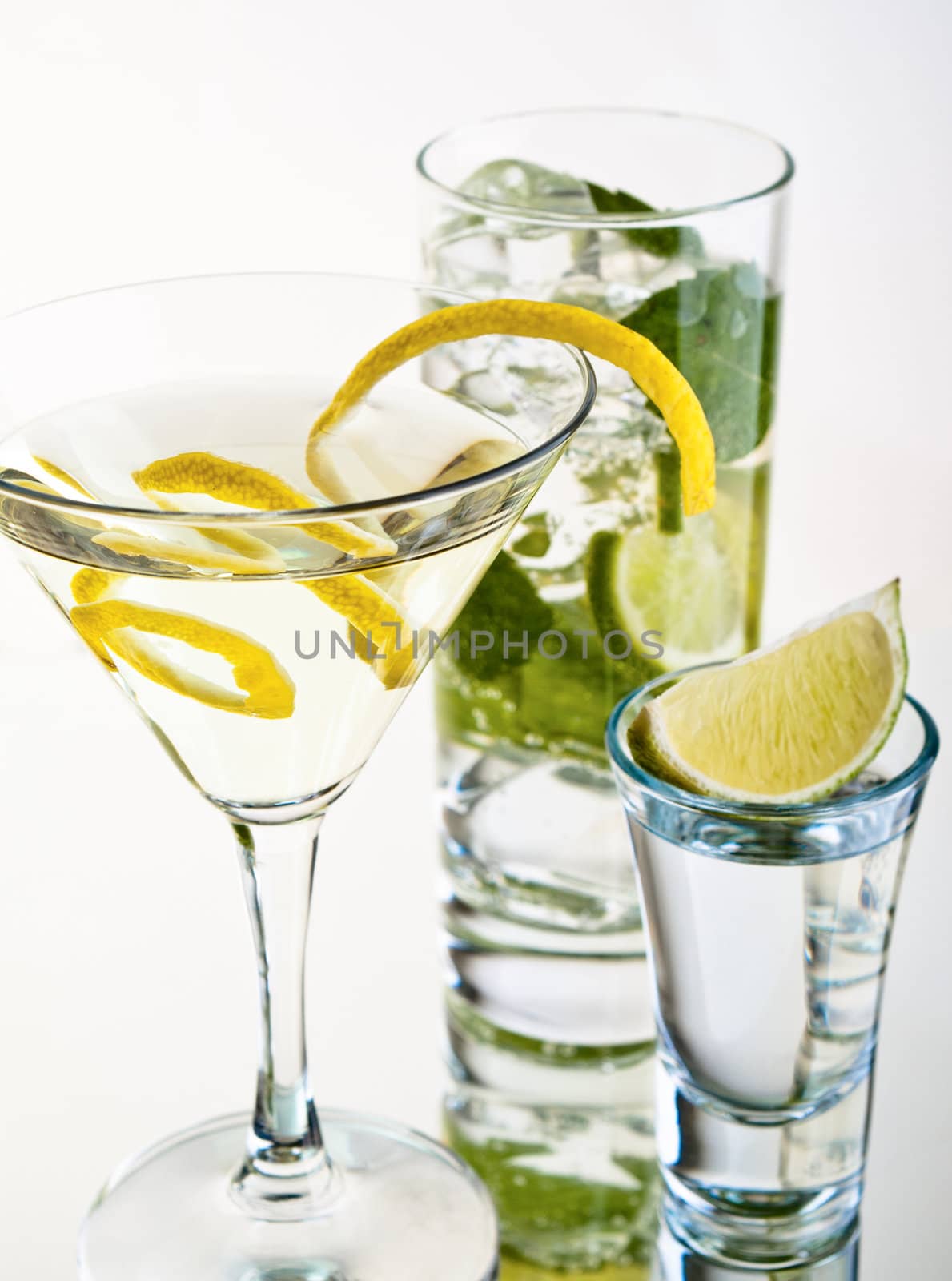 Various cocktails and alcohol on white background by Alex_L