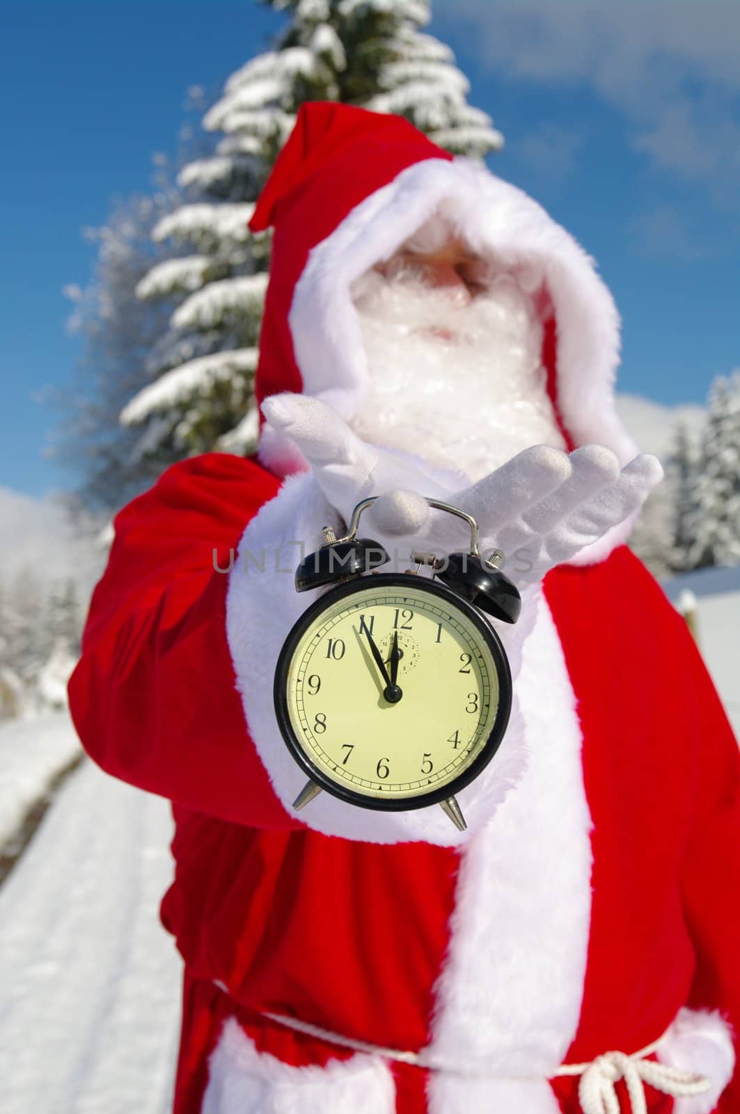 Santa Claus, Father Christmas holds watch clock