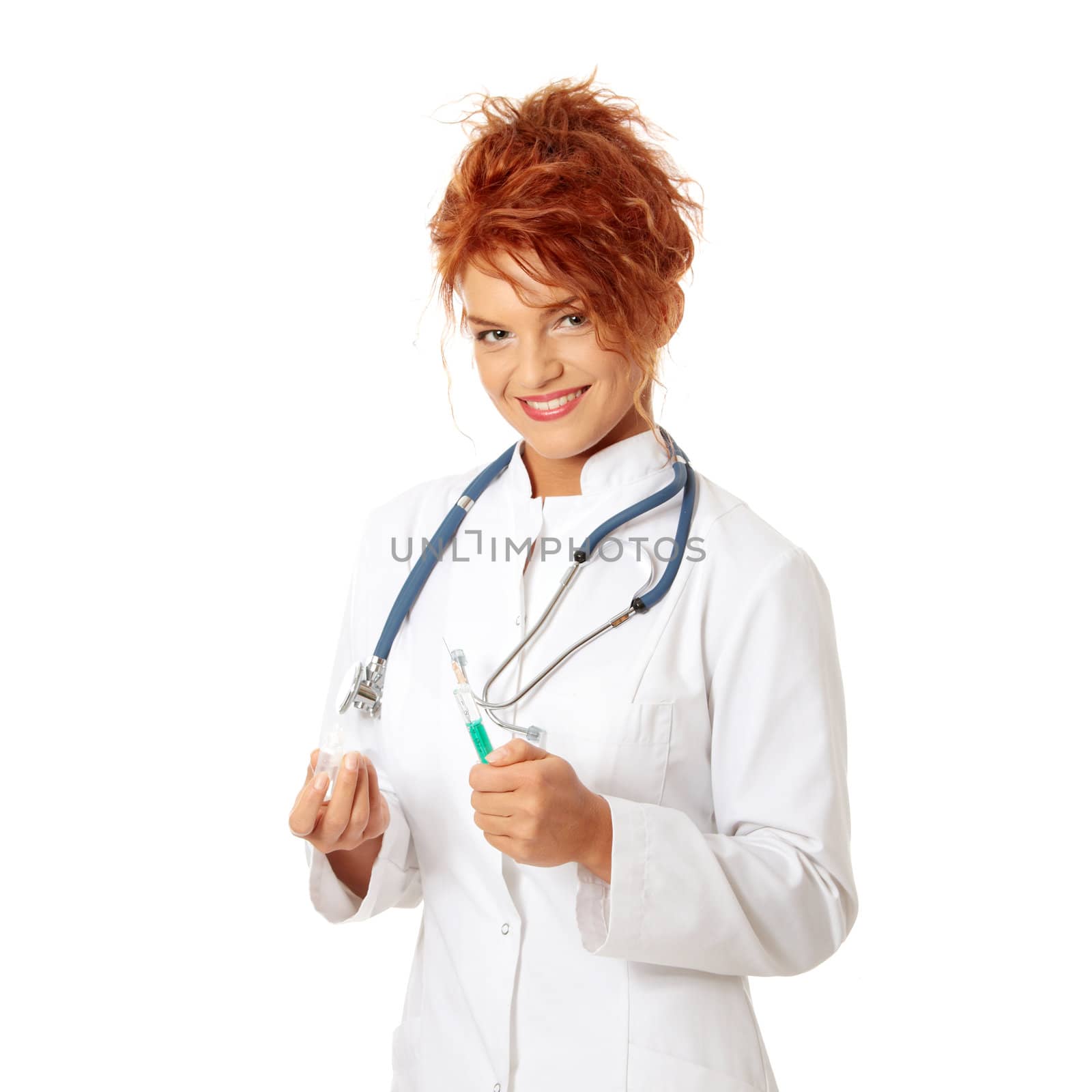 Female doctor or nurse holding syringe by BDS