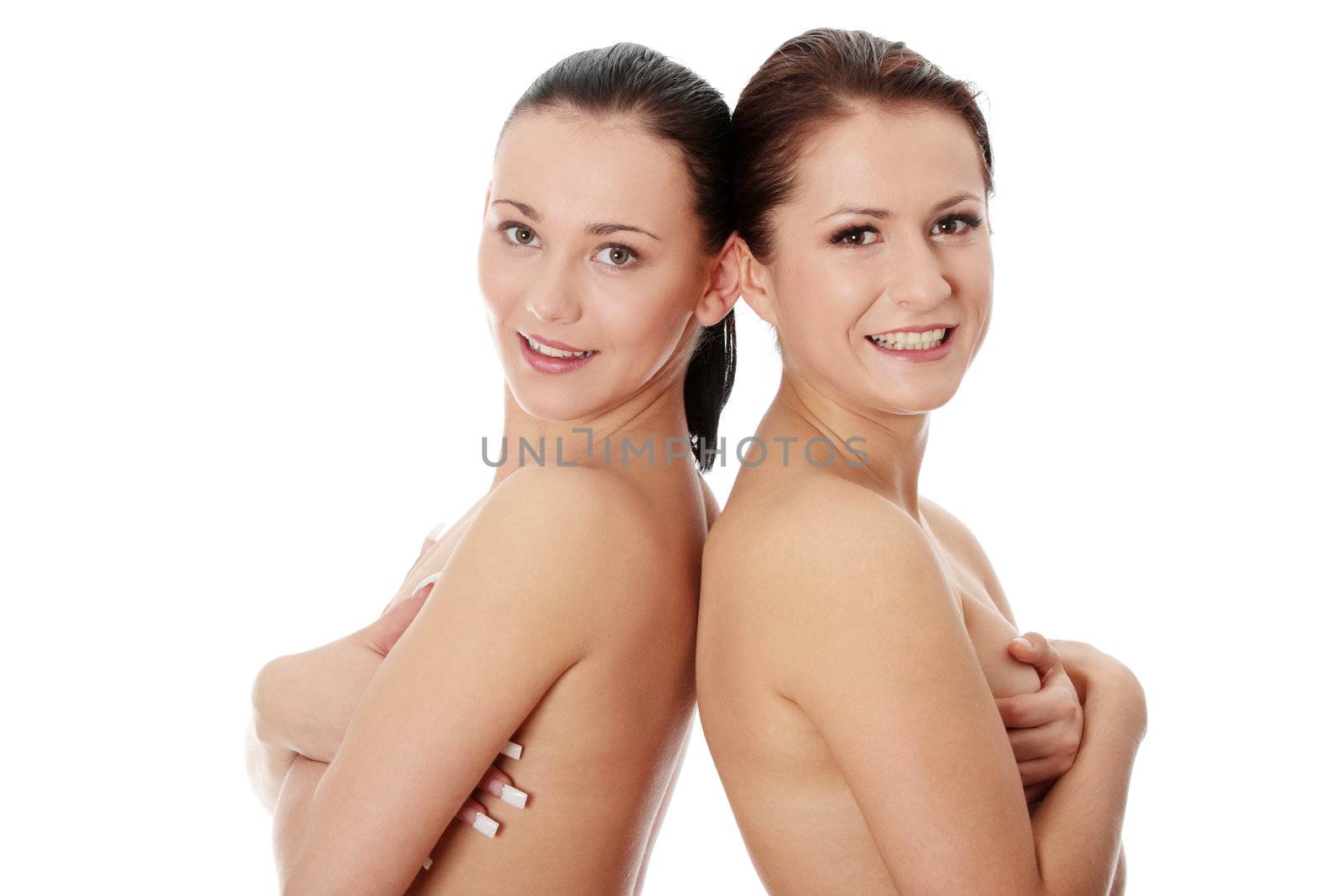 Portrait of a two beautiful sexy young women - Isolated on white