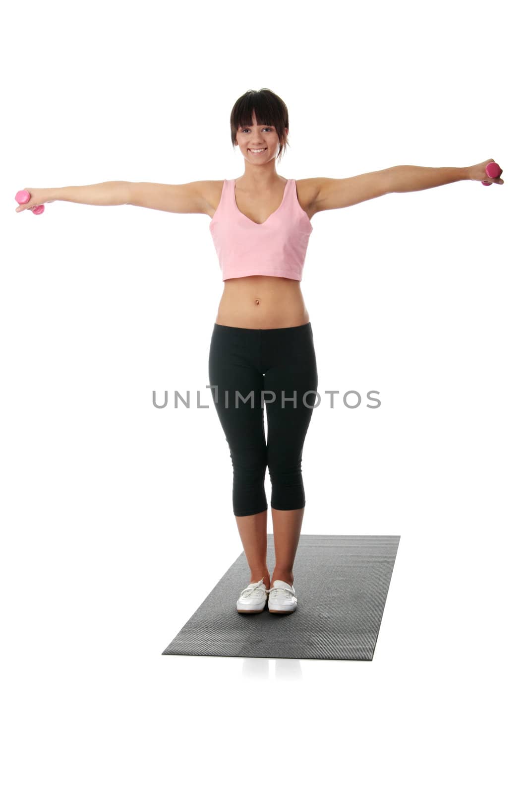 Beautiful young woman doing exercise , isolated