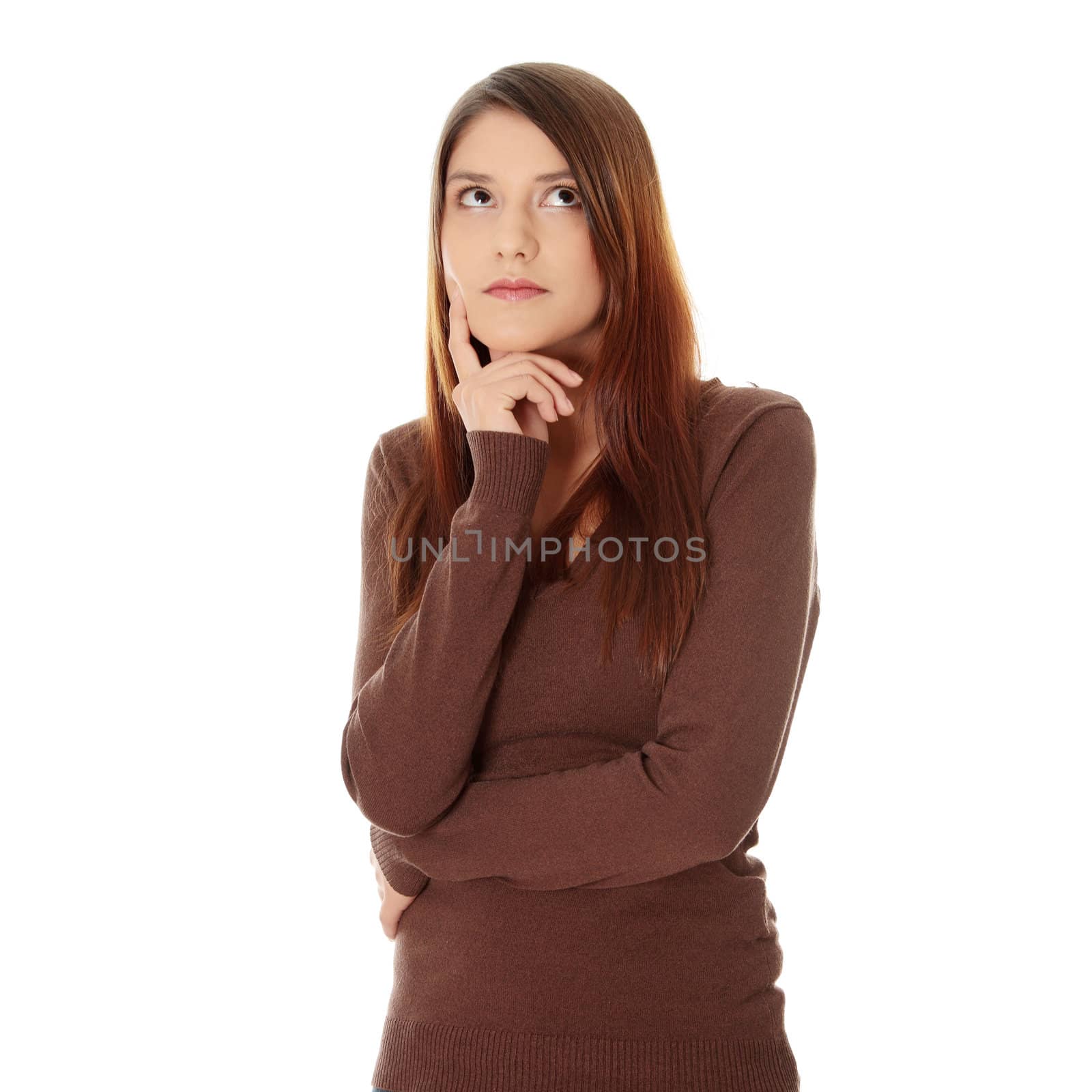 Thoughtful young woman, isolated over a white background