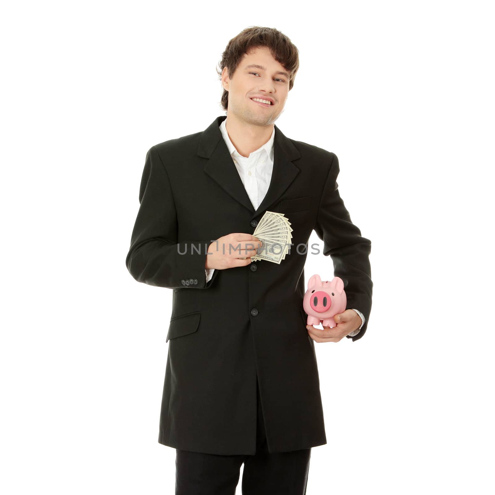 Young business holding piggy bank and dollars , isolated on white