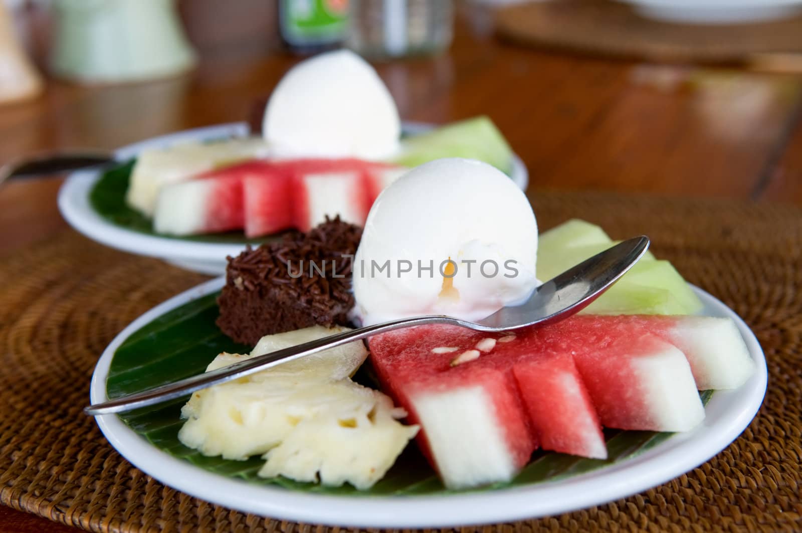 Dish of fruit and ice cream, desert