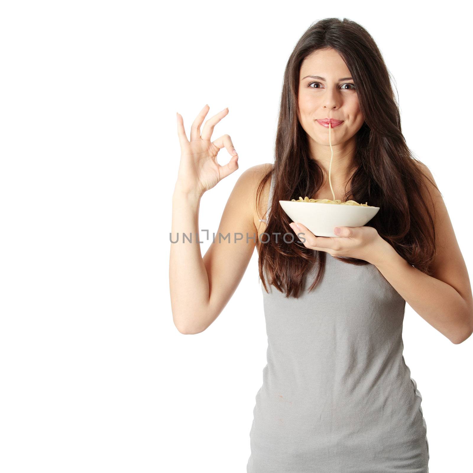 Young beautiful woman eating spaghetti, isolated on white background
