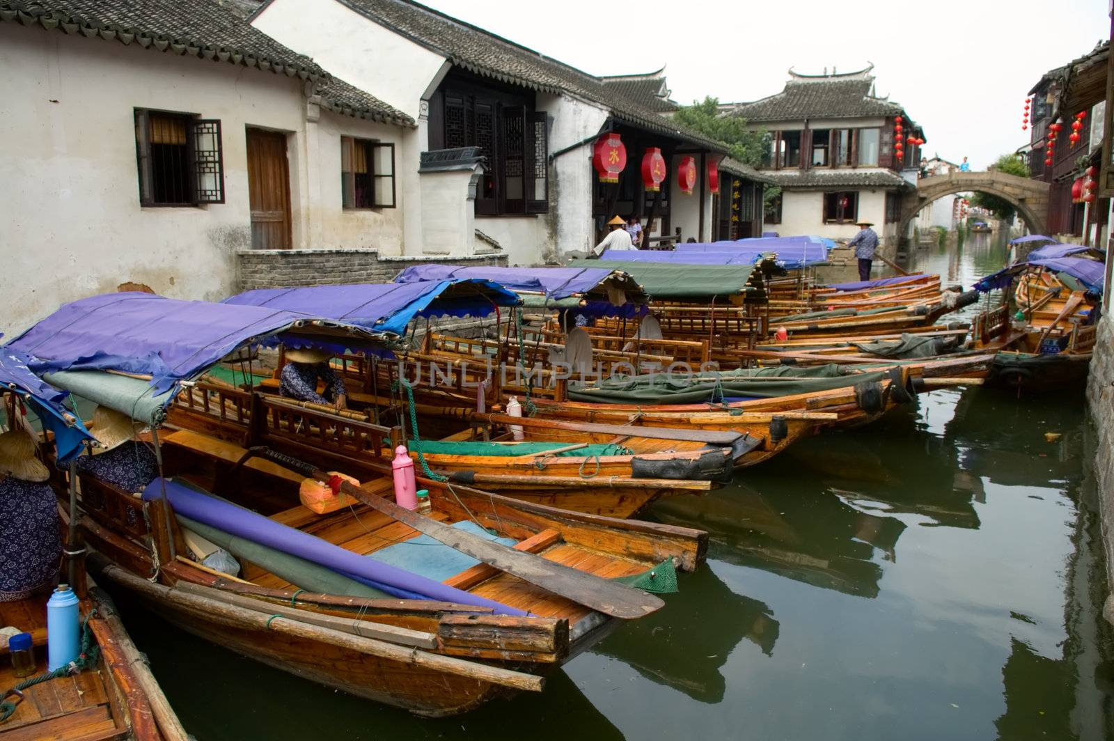 The view of boats docking in canal of water town in China